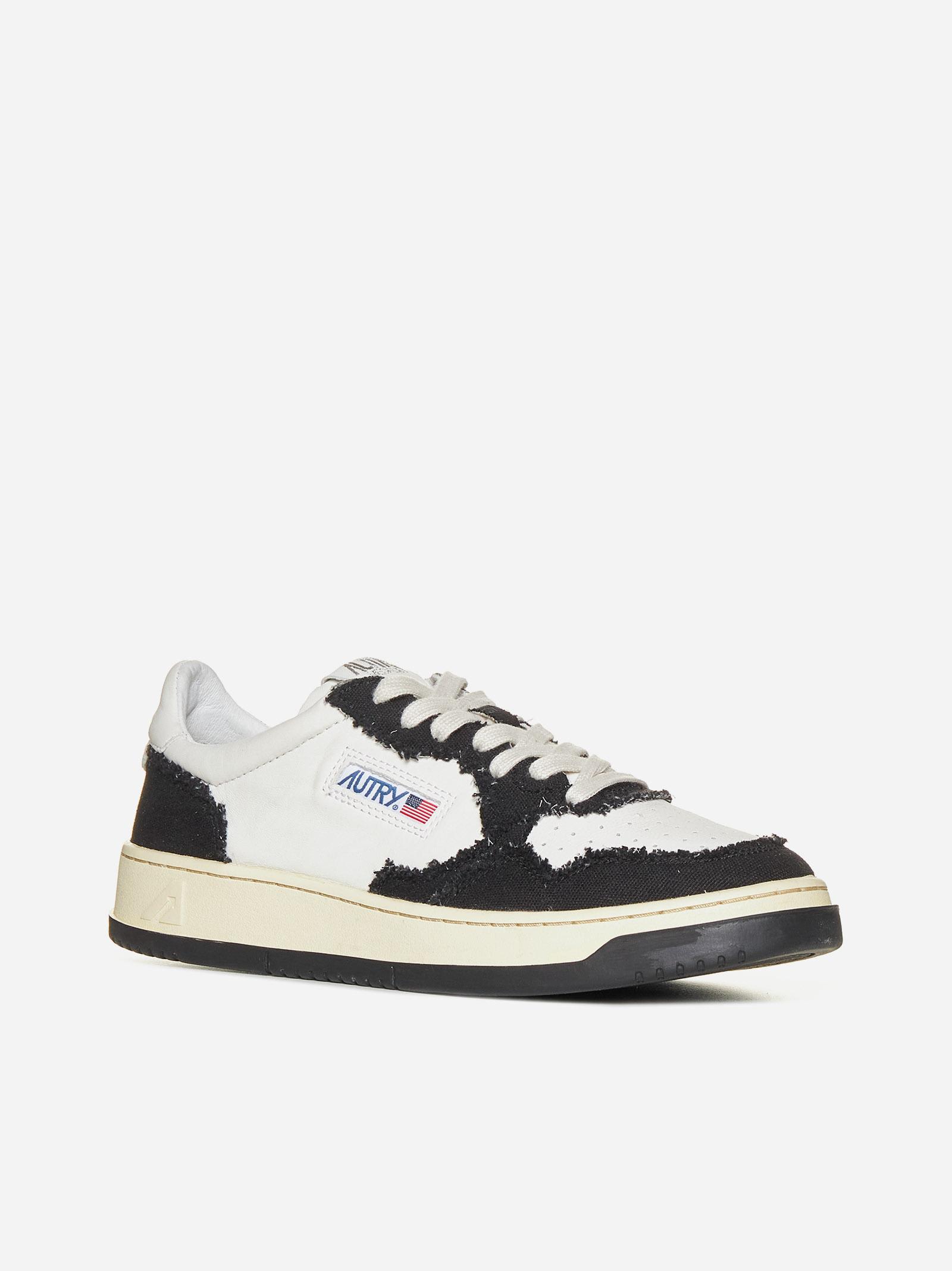 Shop Autry Medalist Leather And Canvas Sneakers In Black