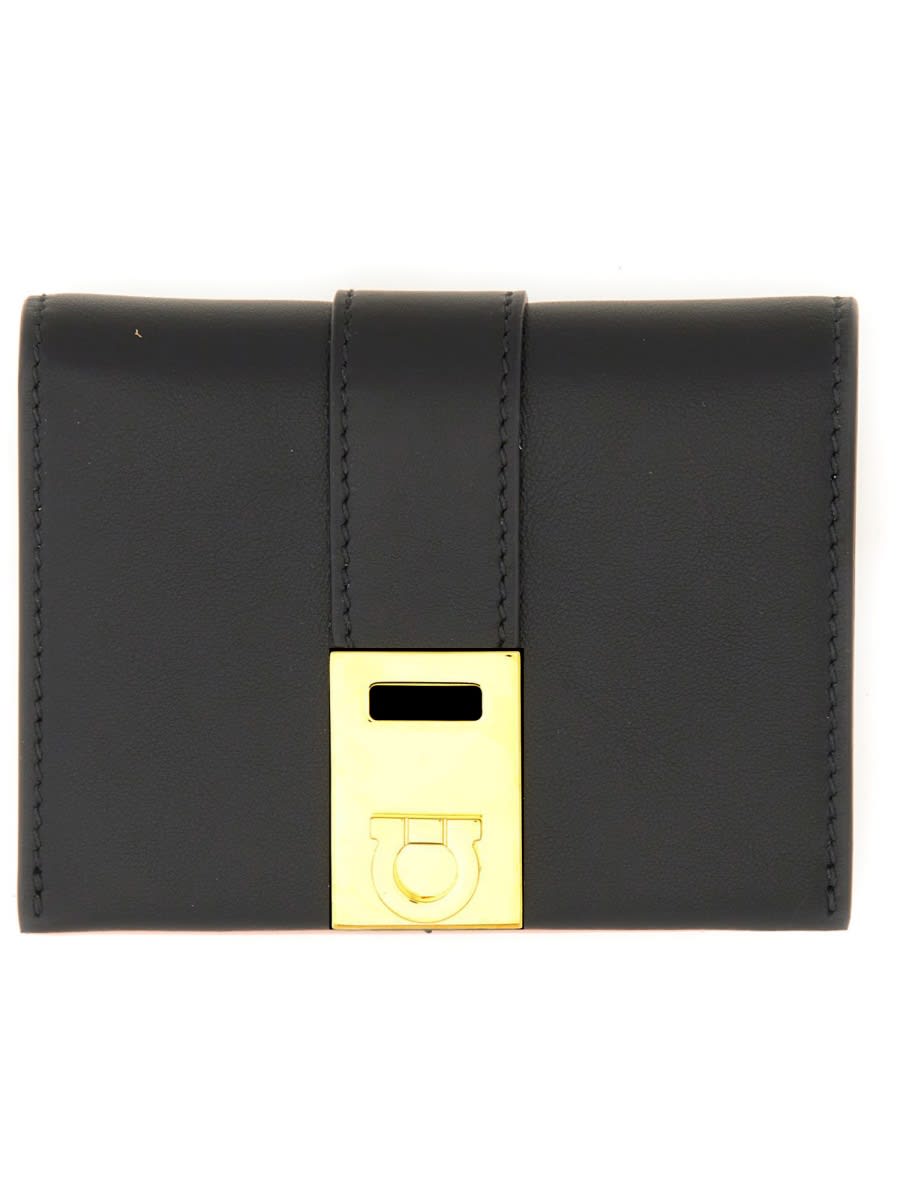 Shop Ferragamo Compact Hug Bicolor Wallet In Black