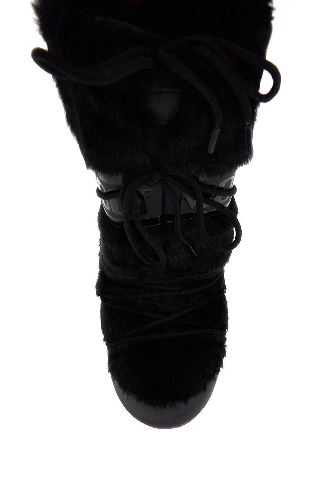Moon Boot Logo Printed Lace-up Snow Boots In Black