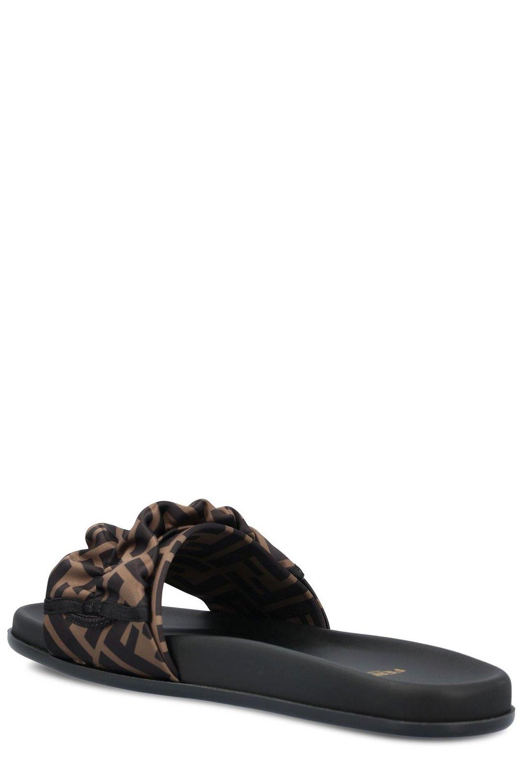 Shop Fendi Toggle Fastening Ff Slide Sandals In Brown