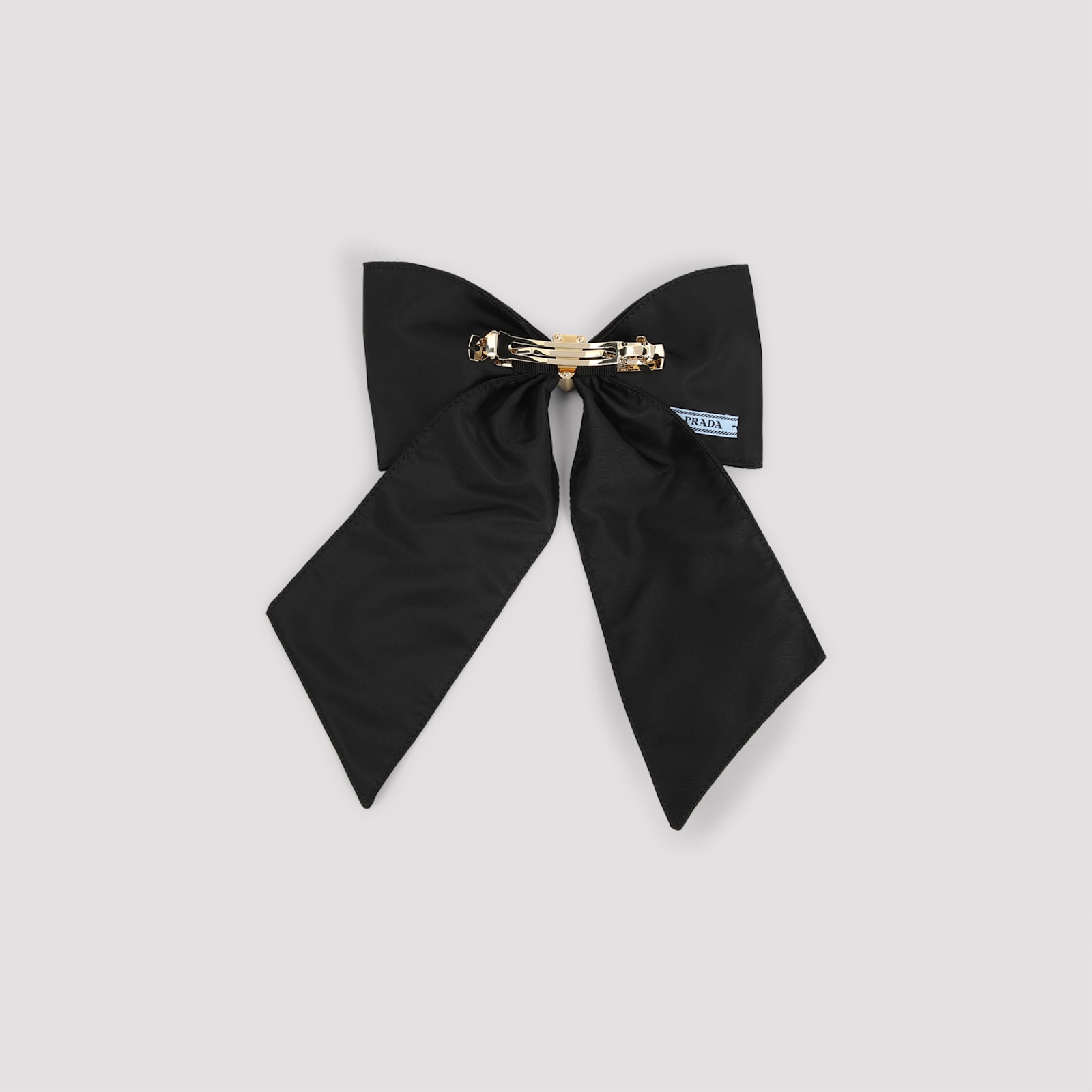Prada Brass Hair Clip With Maxi Bow Design In Black