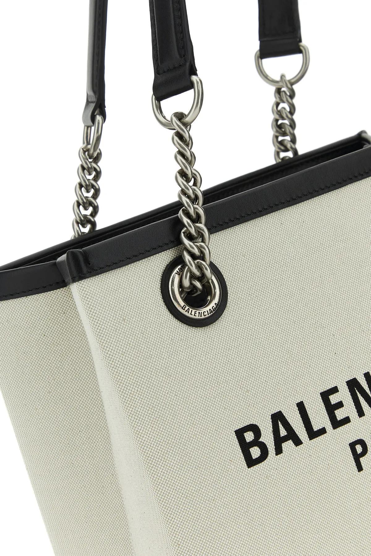 Shop Balenciaga Ivory Canvas S Duty Free Shopping Bag In Beige