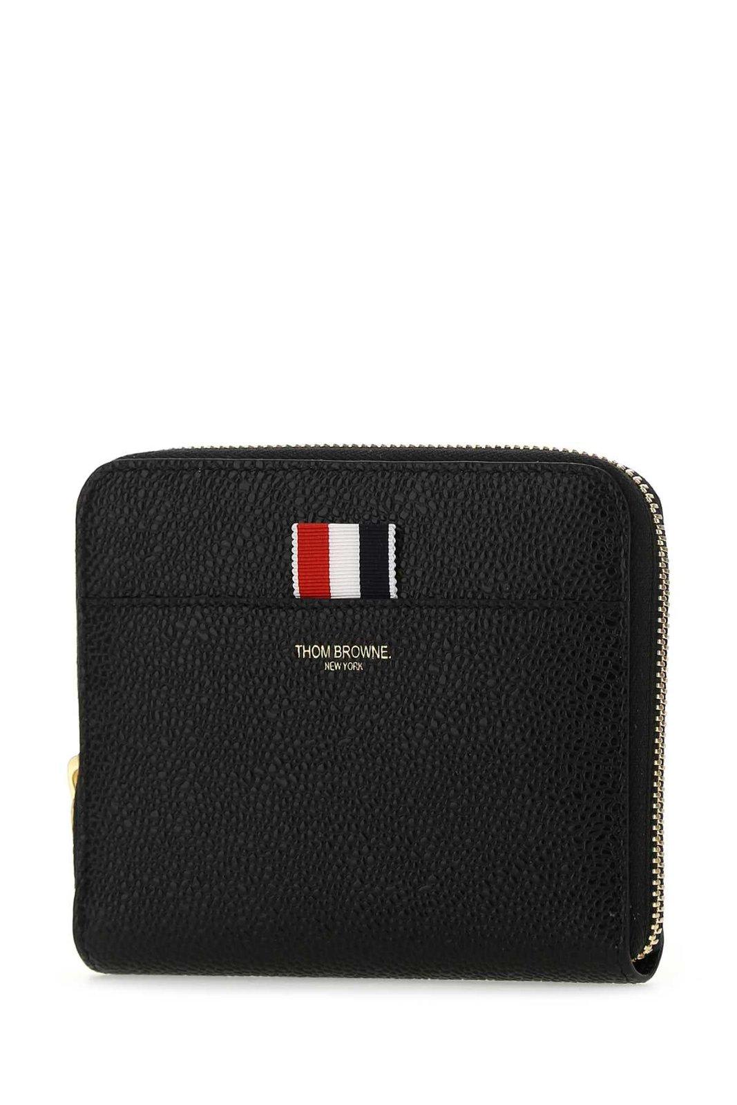 Shop Thom Browne Logo Embossed Zipped Wallet In Black