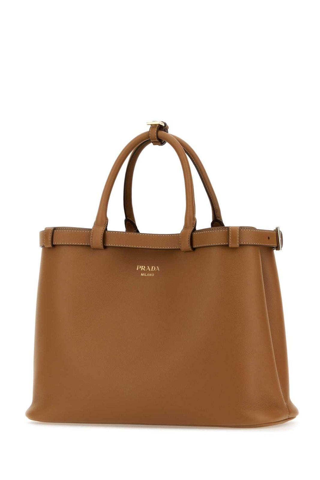 Shop Prada Logo-stamp Belted Medium Handbag In Brown