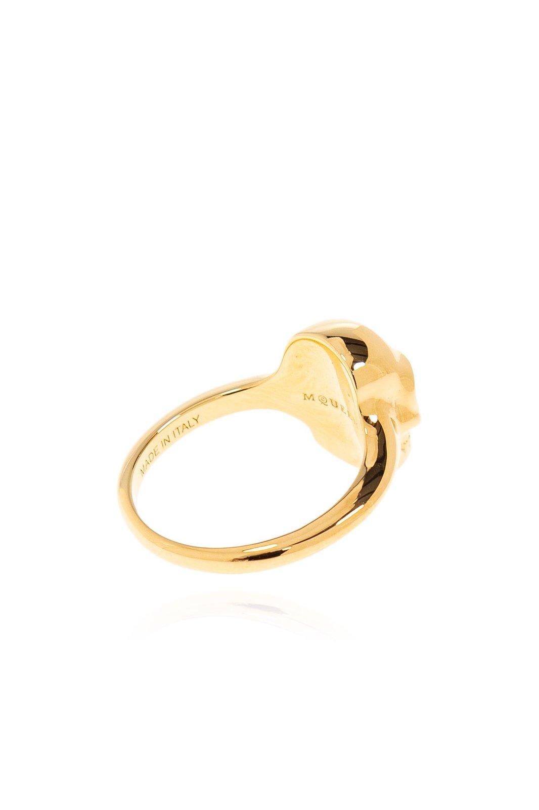 Alexander Mcqueen Polished Gold-tone Ring With Engraved Skull Design In Gold