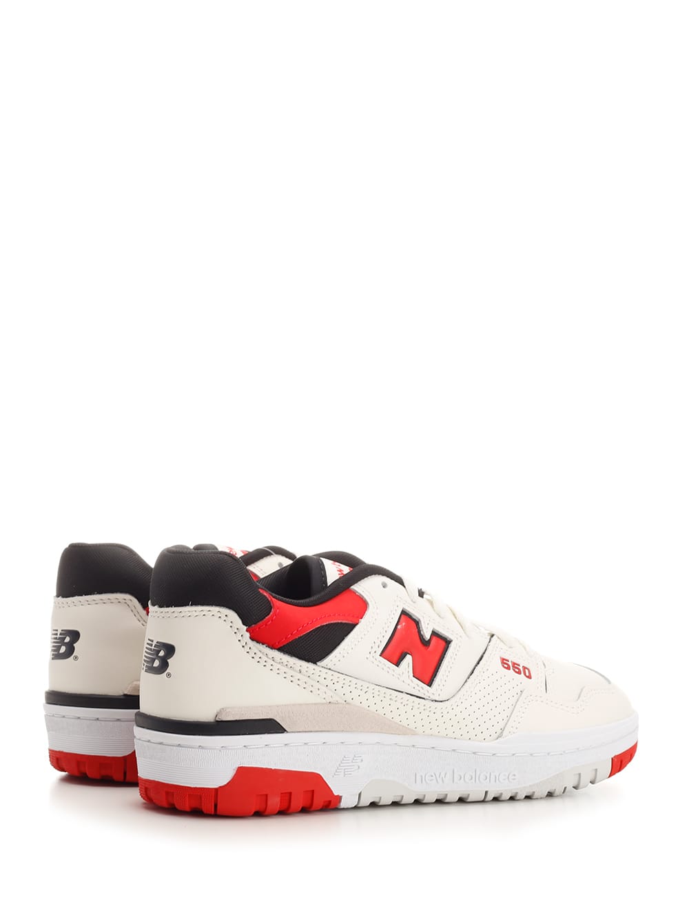 Shop New Balance 550 Sneakers In White