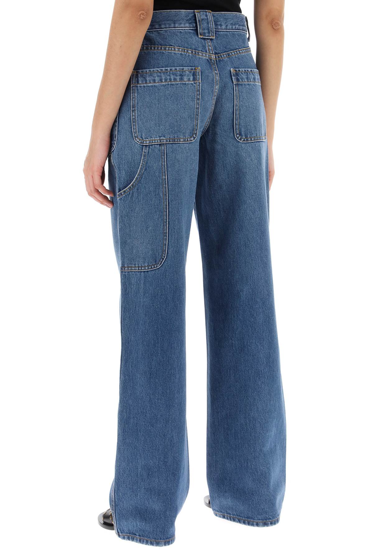 Shop Tory Burch High-waisted Cargo Style Jeans In In Dark Vintage Wash (blue)