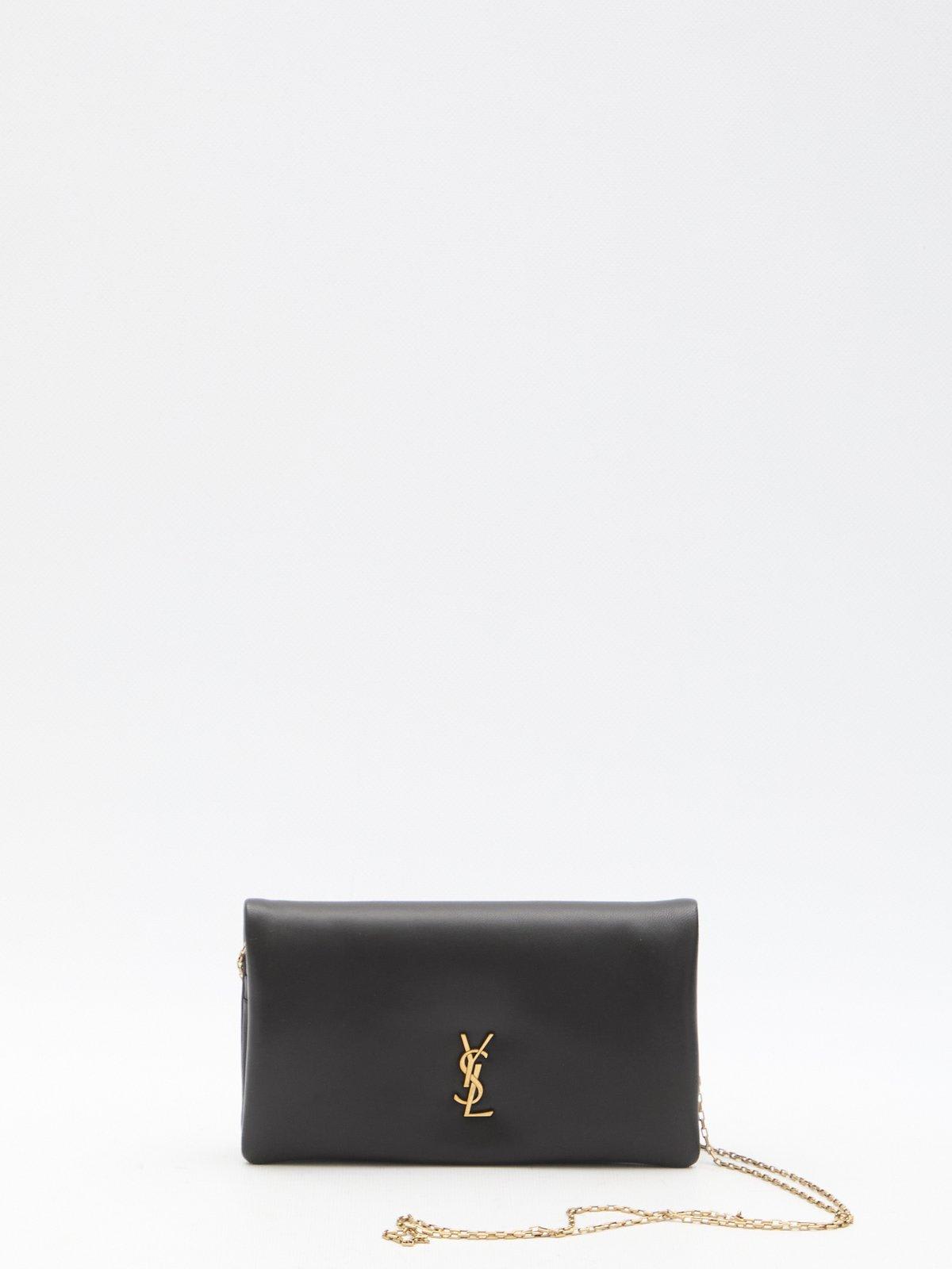 Shop Saint Laurent Logo Plaque Bi-fold Wallet In Noir