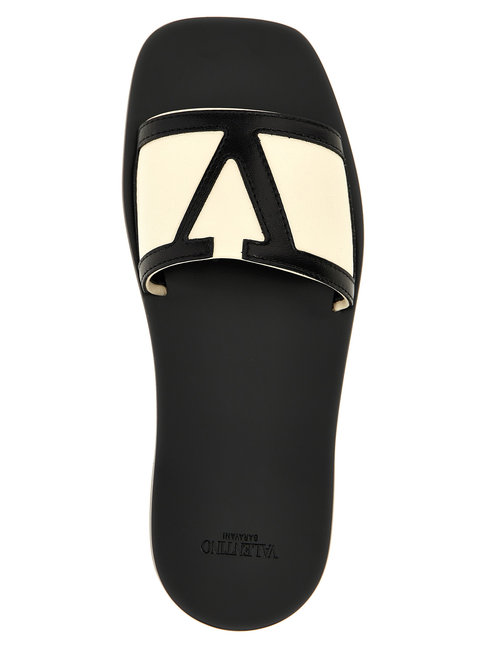Shop Valentino Garavani Vlogo Sandals In White/black