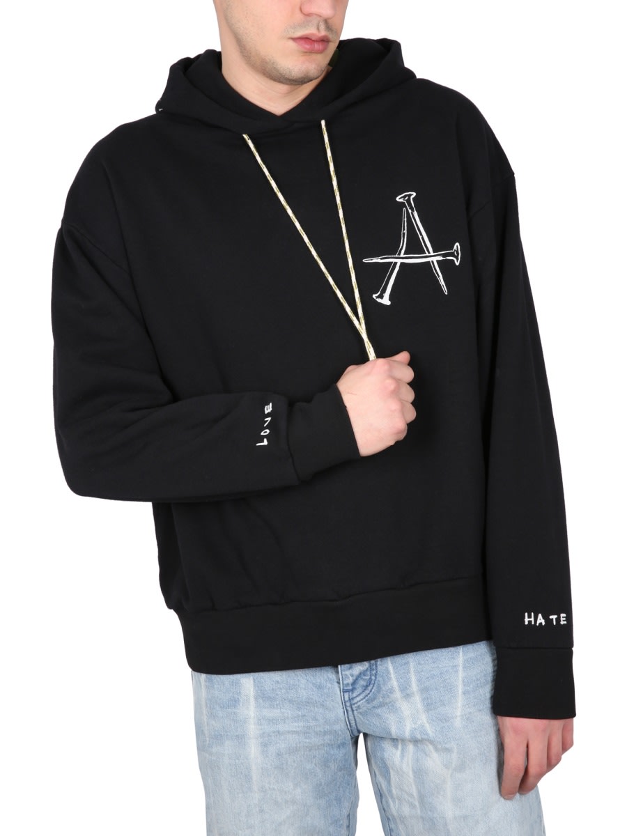 Aries Hoodie With Drawstring Hood And Back Detail In Black
