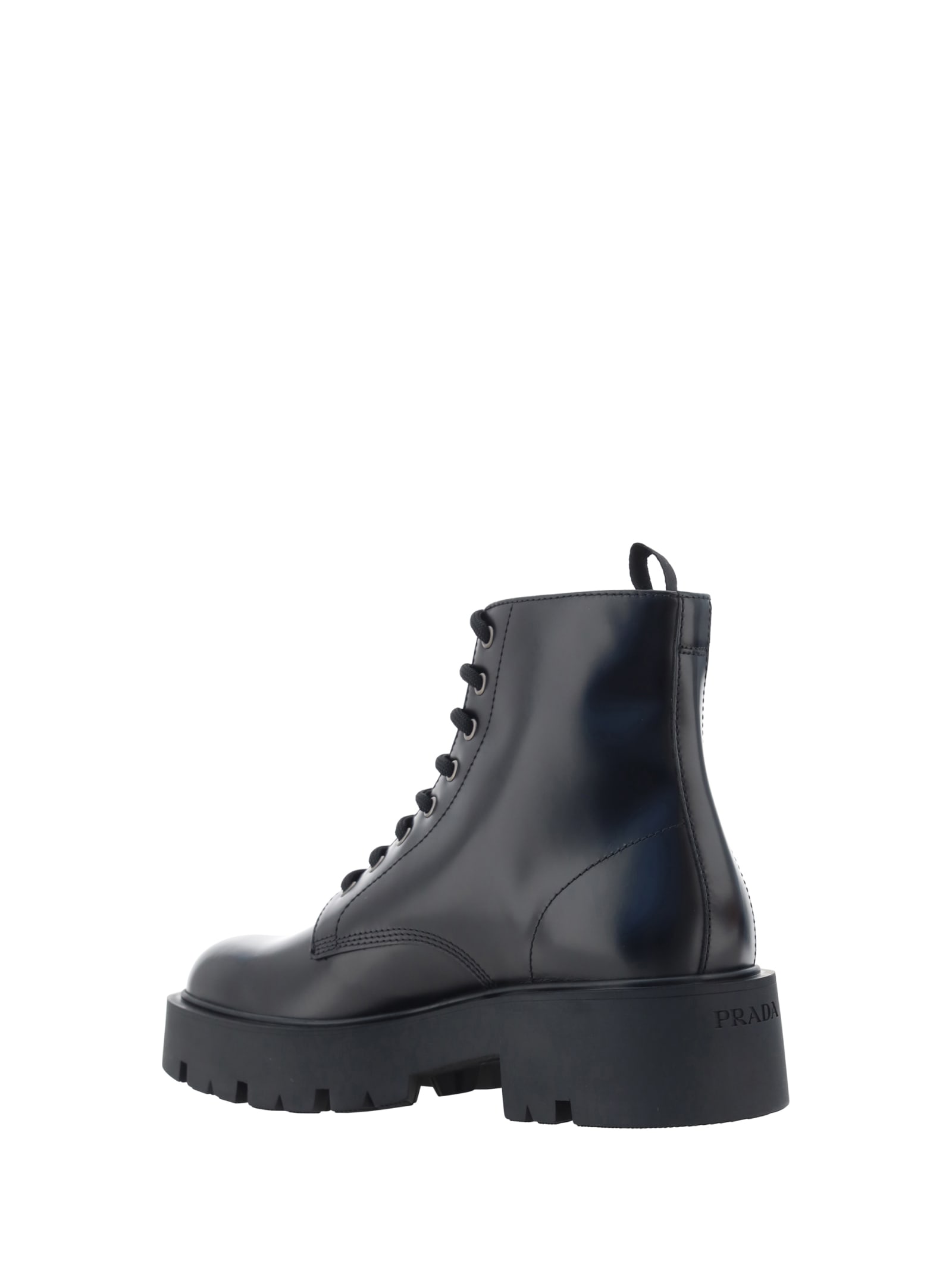 Shop Prada Ankle Boots In Nero