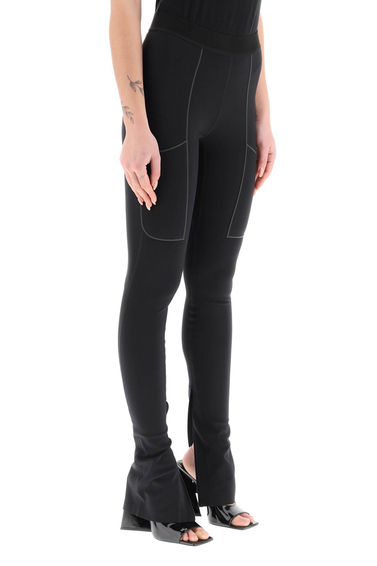 Shop Coperni Zippered Cuff Leggings In Black (black)