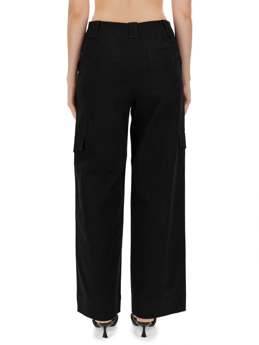 Shop Ganni Herringbone Pants In Black