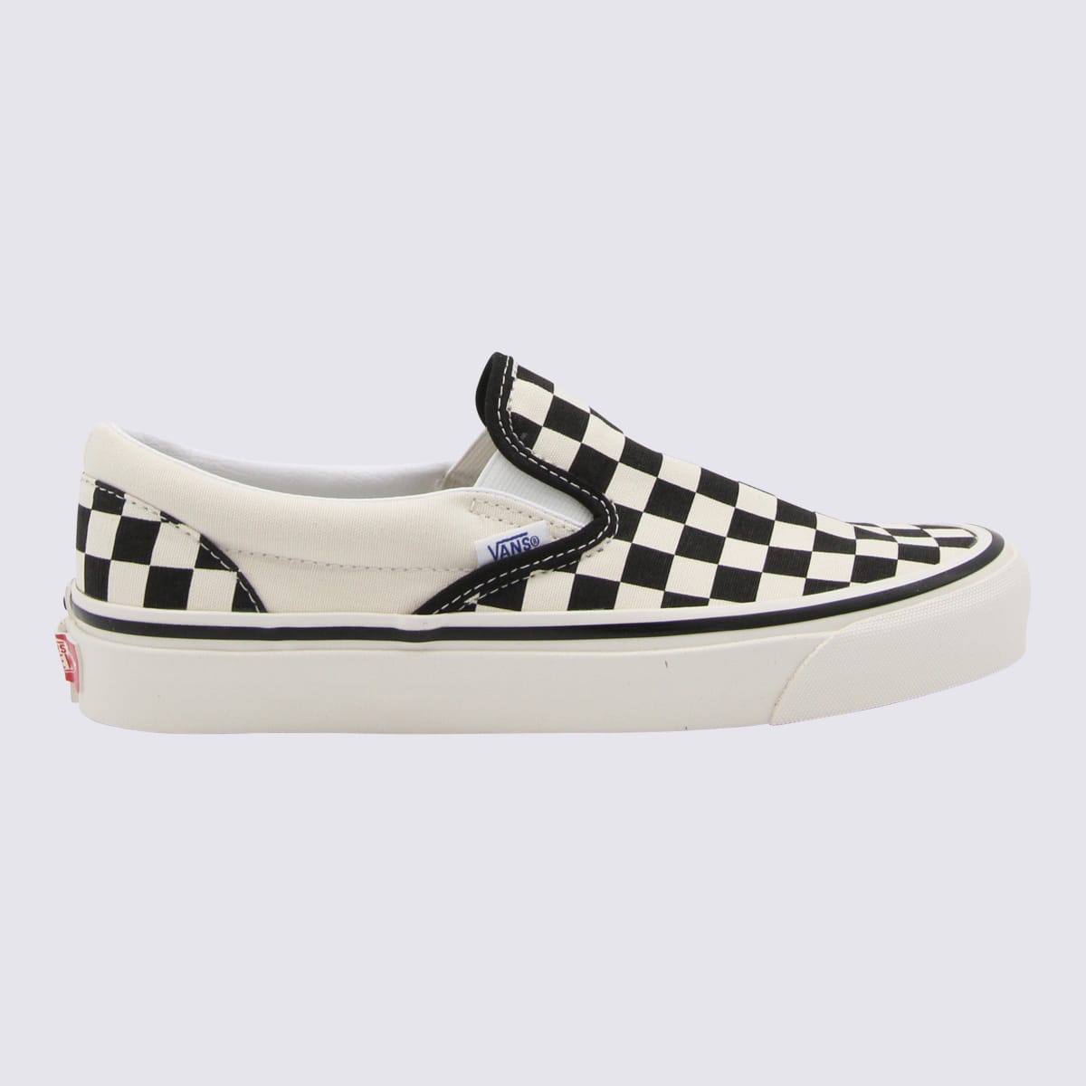 Vans White And Black Canvas Sneakers