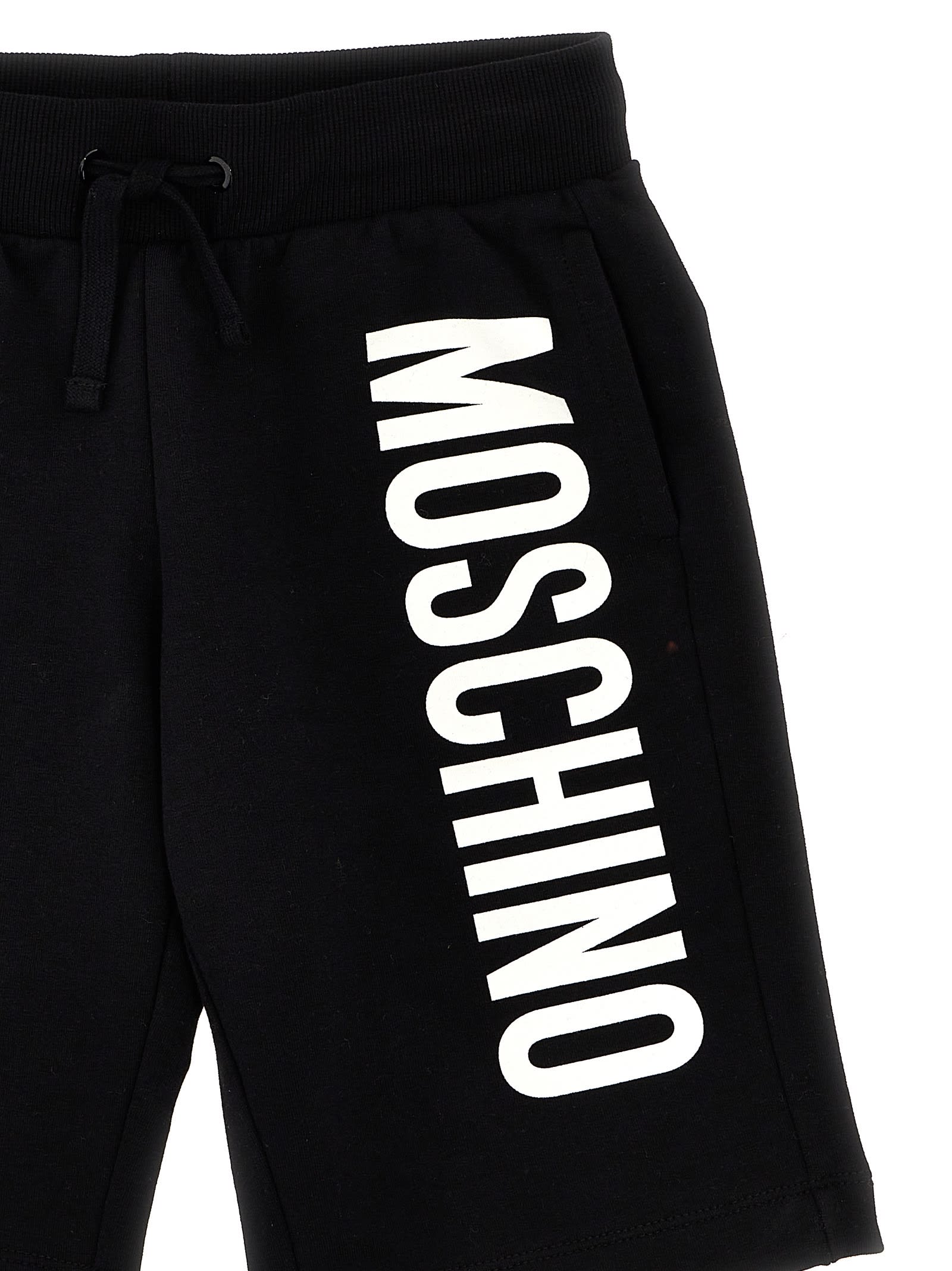 Shop Moschino Logo Print Shorts In White/black