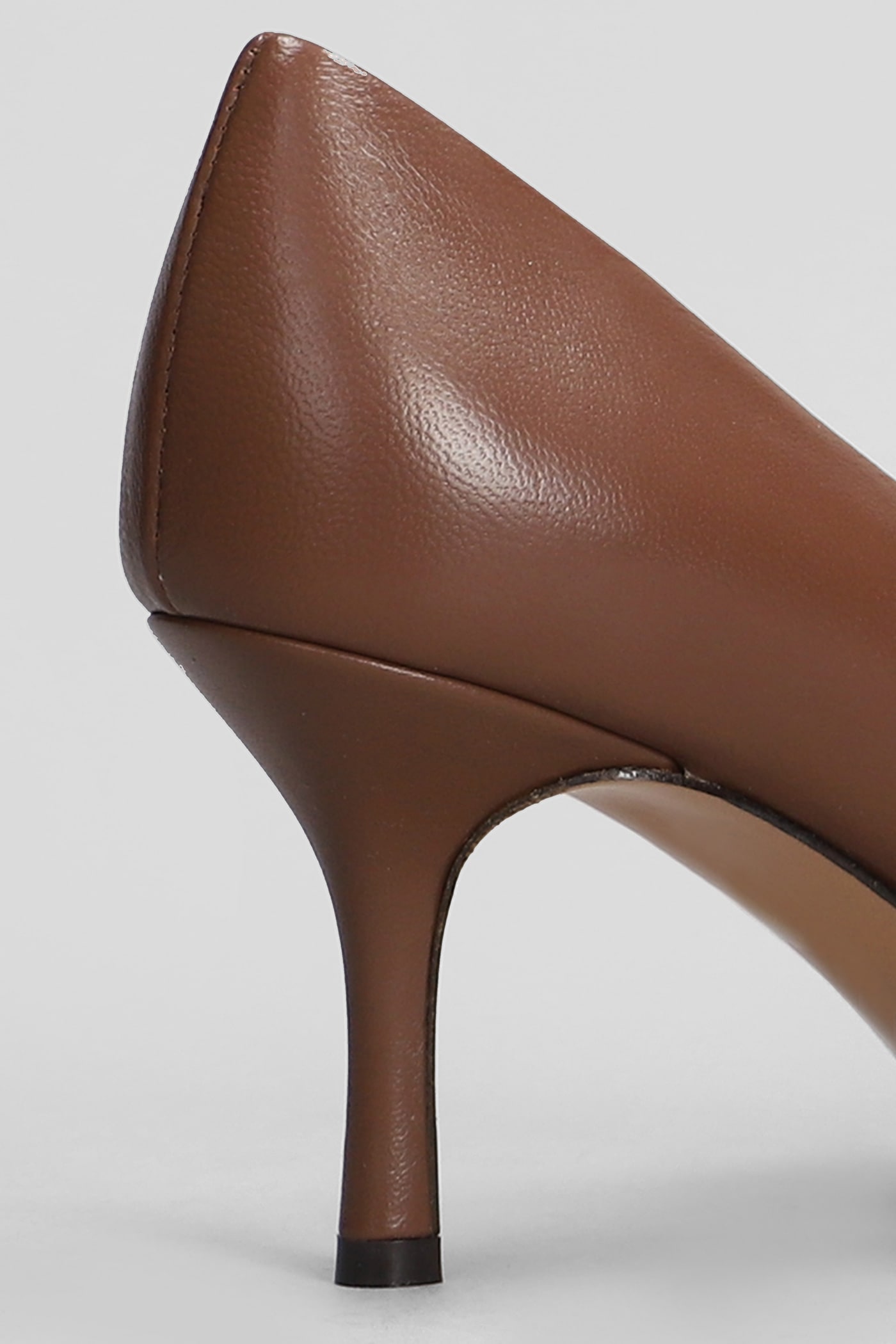 Shop The Seller Pumps In Brown Leather