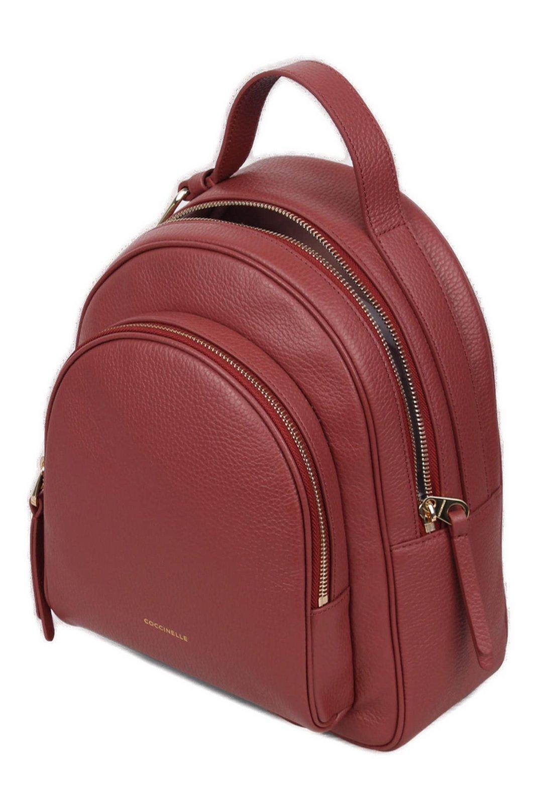 Shop Coccinelle Malory Zipped Medium Backpack In Brandy