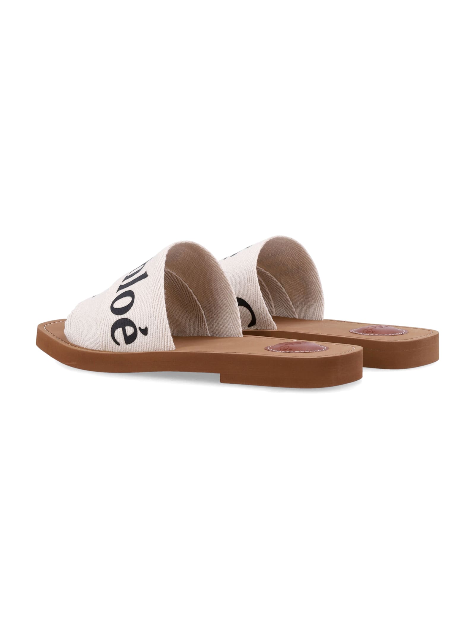 Shop Chloé Woody Slides Sandals In White