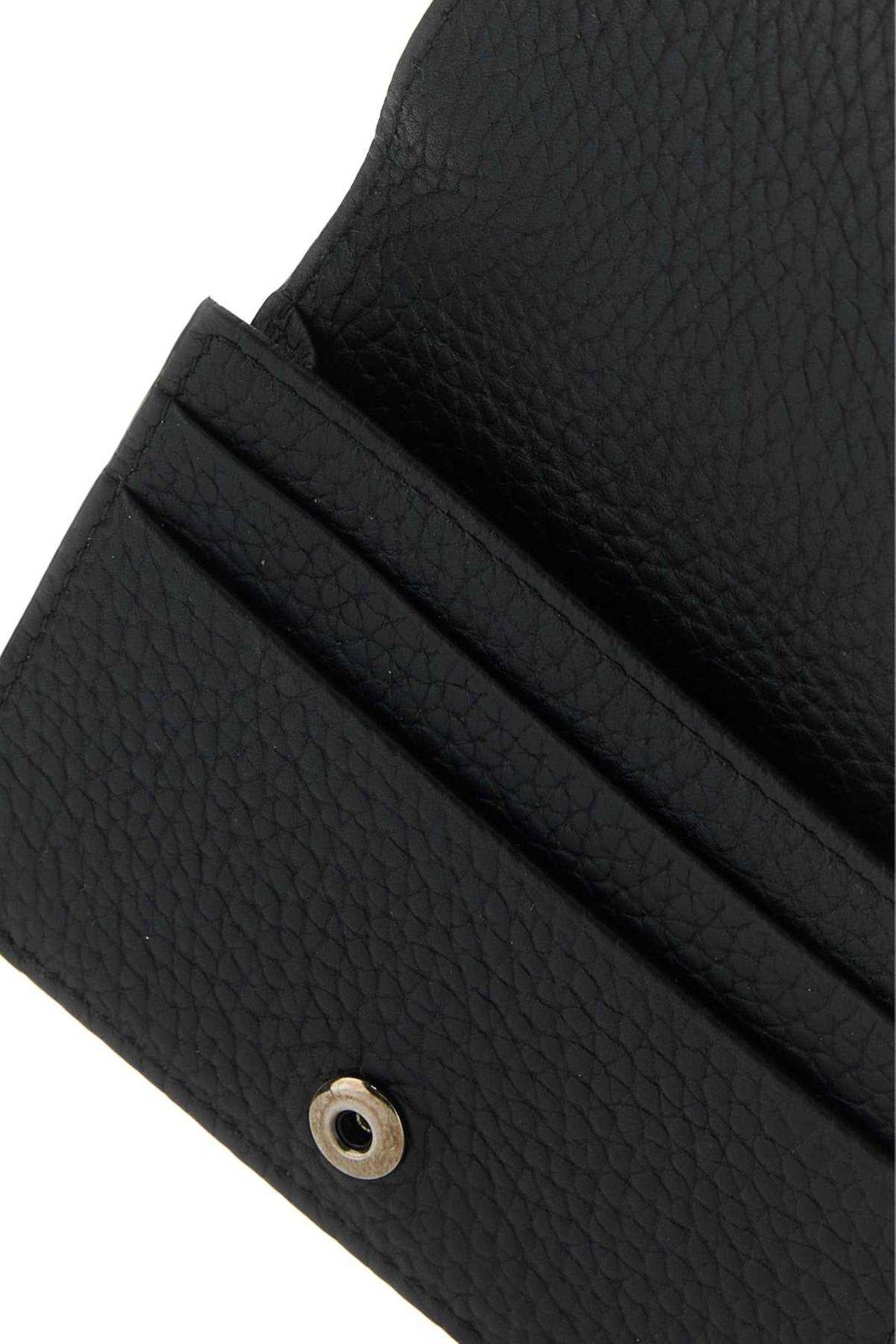 Shop Dolce & Gabbana Logo Embossed Foldover Top Wallet In Nero (black)