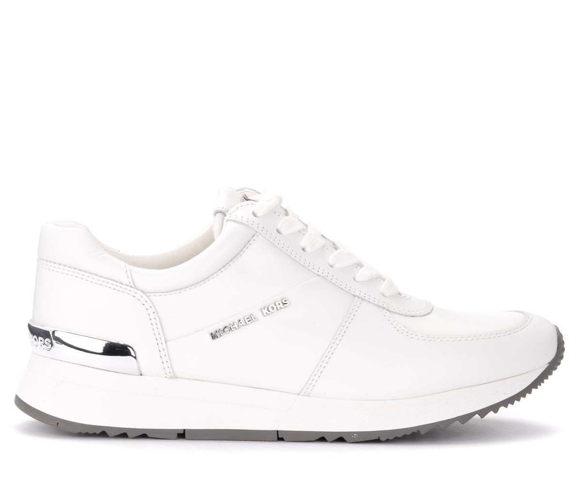 Buy Michael Kors Allie Sneakers In White Leather online, shop Michael Kors shoes with free shipping