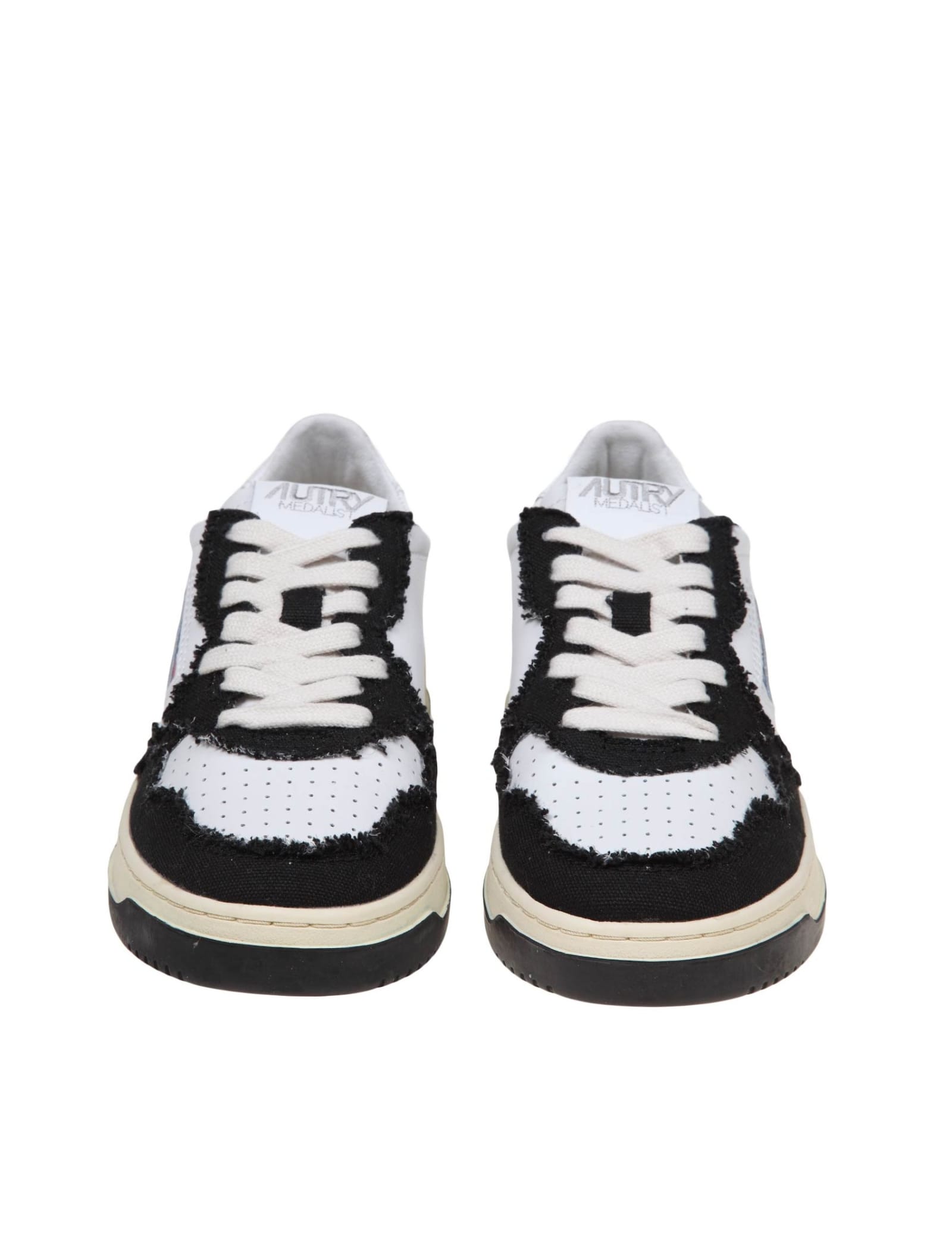 Shop Autry Sneakers In Black And White Leather And Canvas In White/black