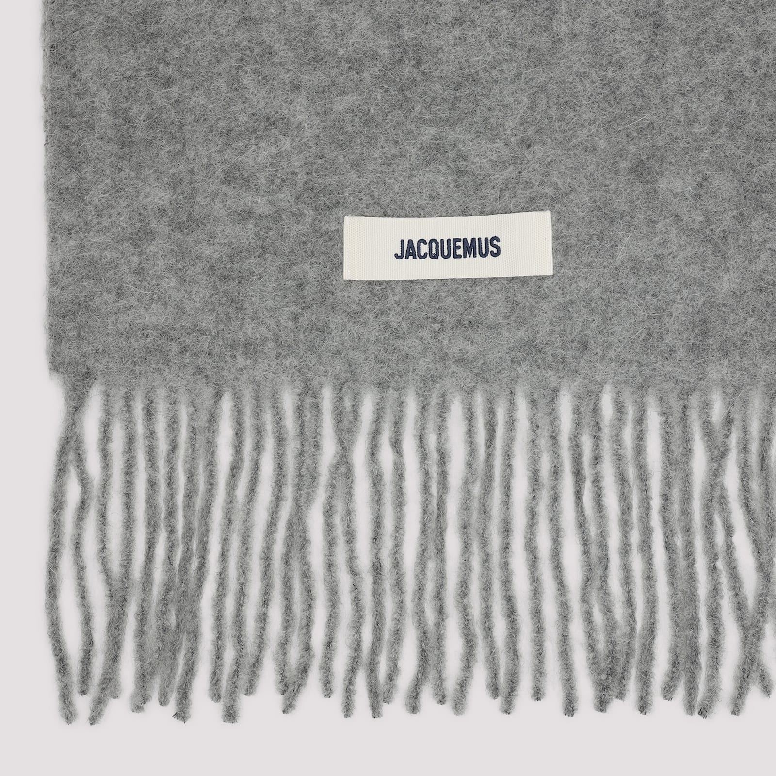 Jacquemus Carro Scarf With Fringed Detailing In Gray