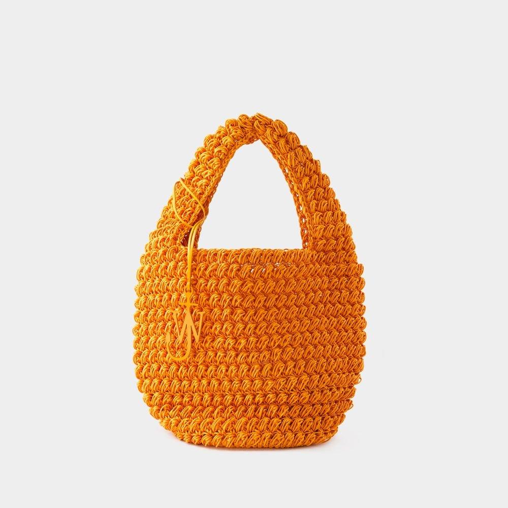 Shop Jw Anderson Logo Charm Popcorn Large Basket Bag In Orange