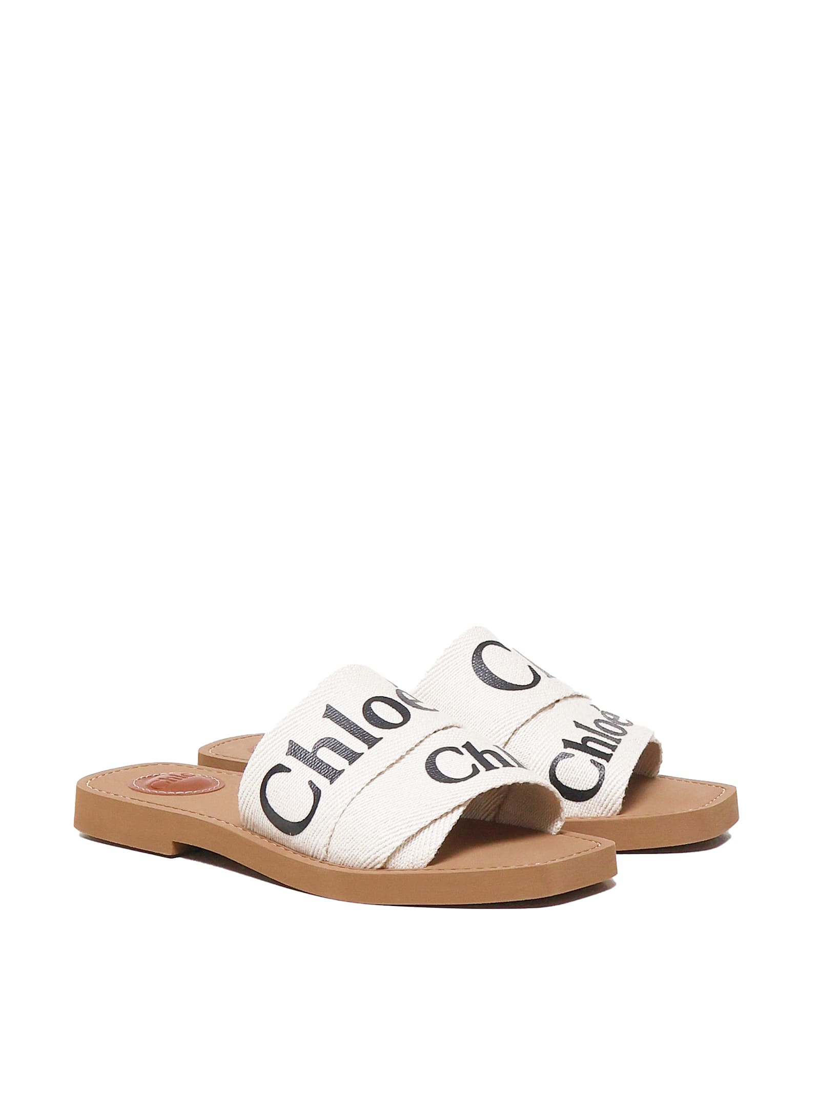 Shop Chloé Woody Slides In White