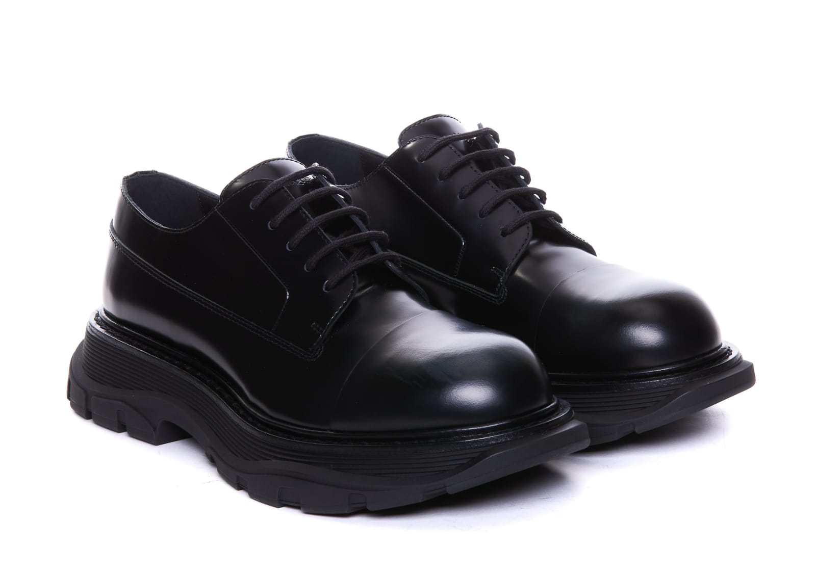 Shop Alexander Mcqueen Tread Laced Up Shoes In Black
