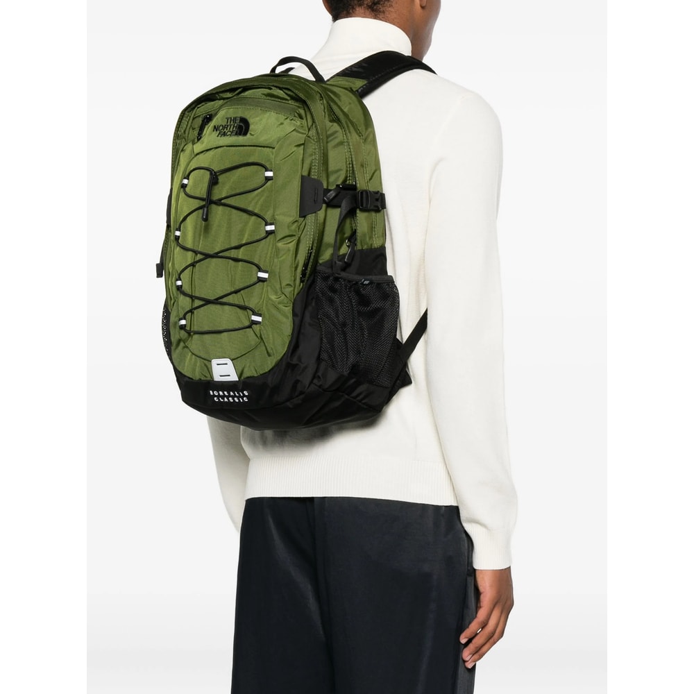 The North Face Backpack With Front Zip Pocket And Bungee Cord System In Green