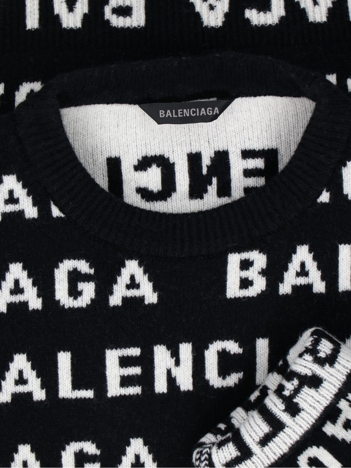 Shop Balenciaga All-over Logo Sweater In Black