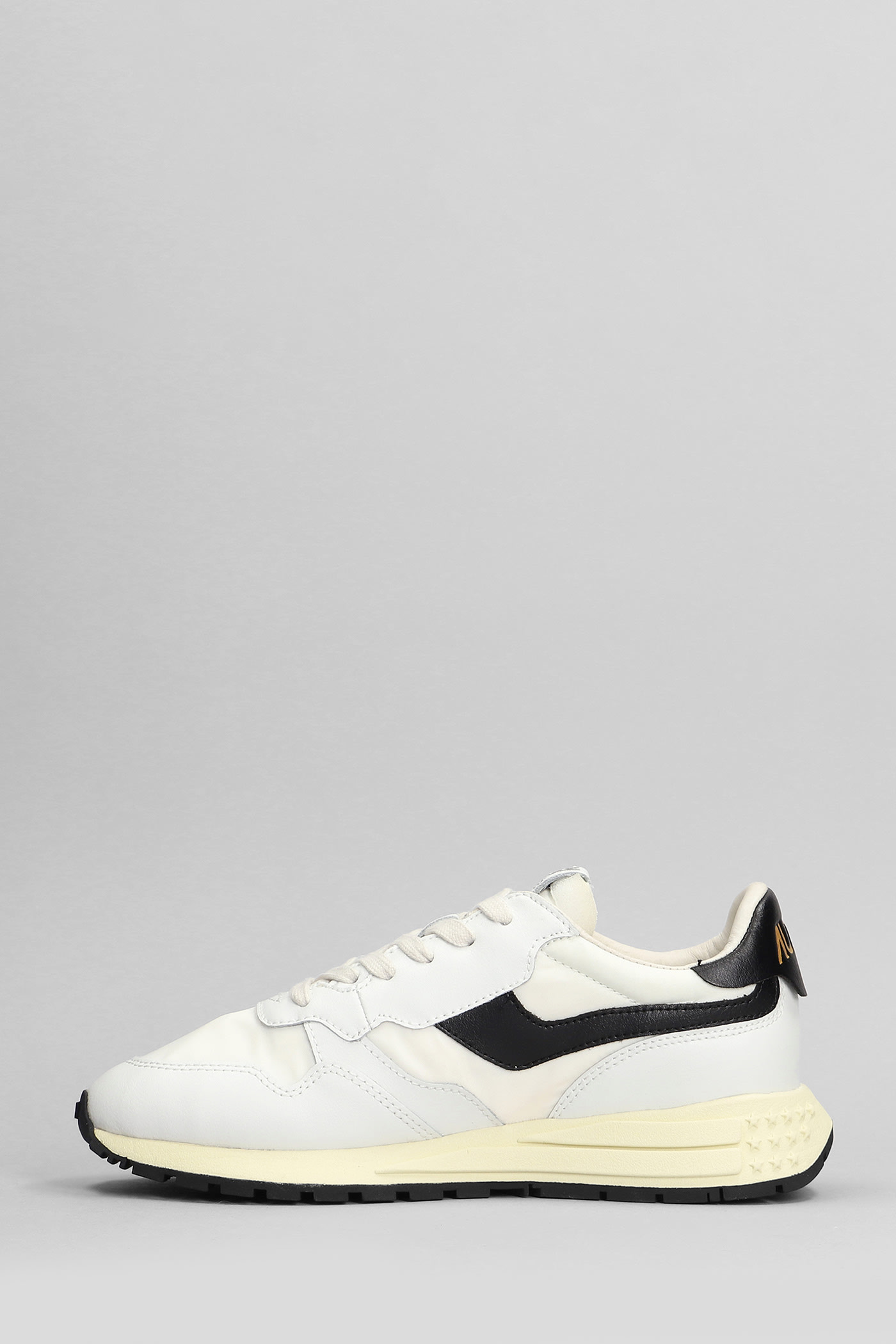 Shop Autry Reelwind Low Sneakers In White Leather And Fabric In White/black