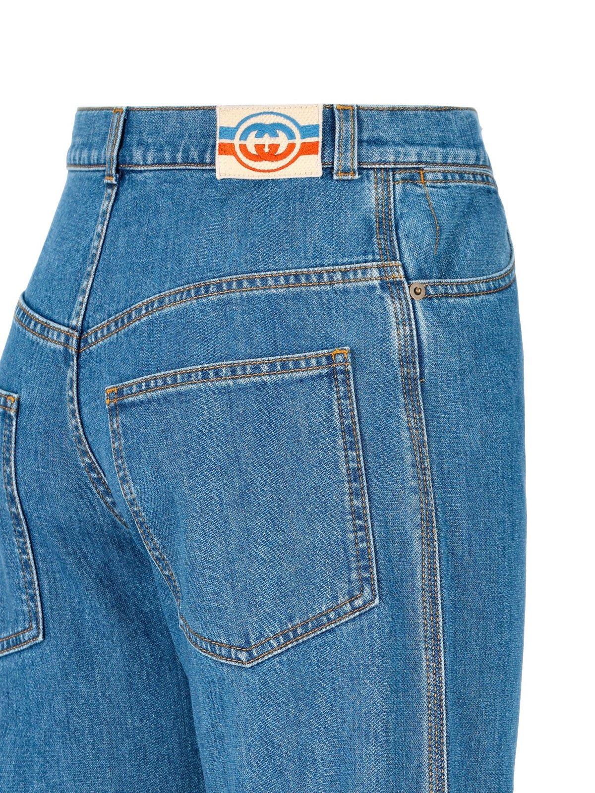 Shop Gucci Logo Patch Flared Jeans In Blu