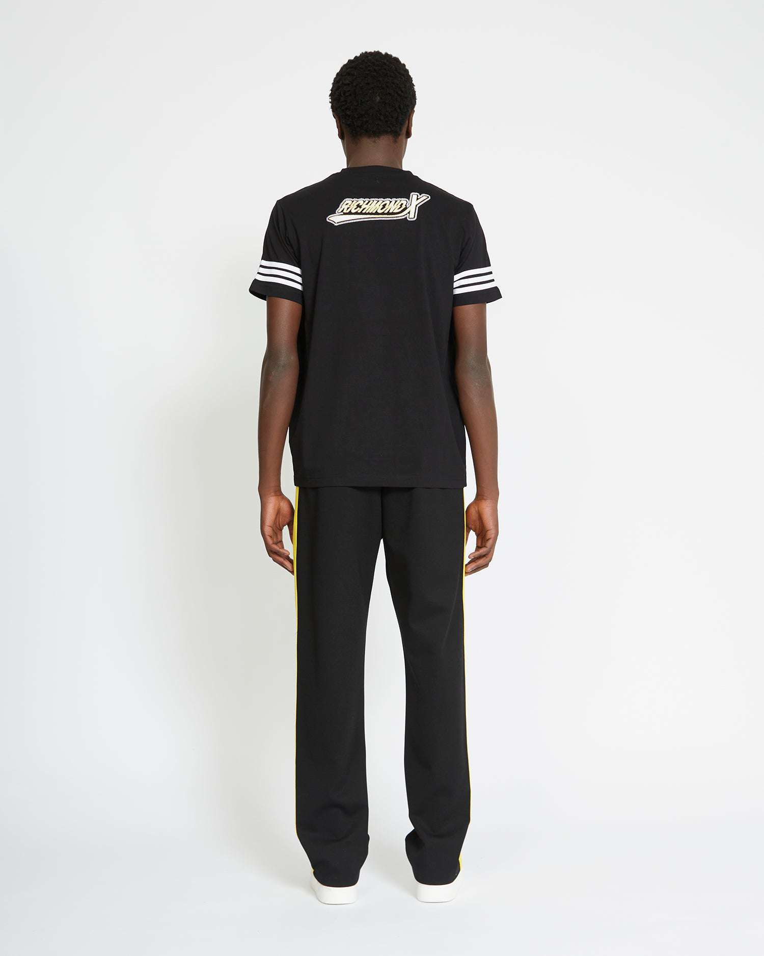 Shop John Richmond T-shirt With Logo On The Back And Side Bands On The Sleeves In Nero