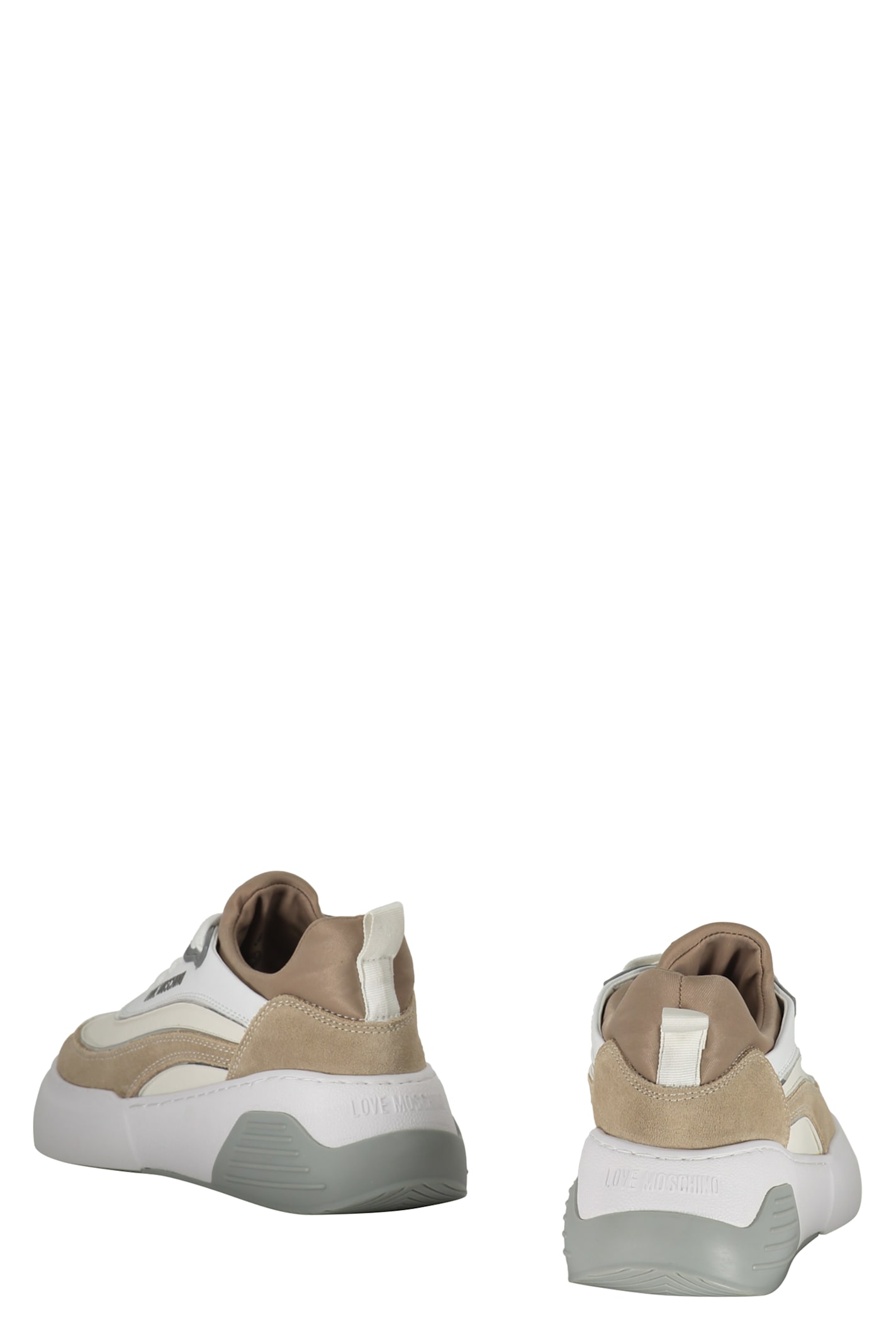 Shop Love Moschino Low-top Sneakers In White