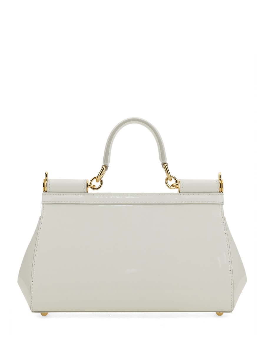 Shop Dolce & Gabbana Elongated Sicily Handbag In White