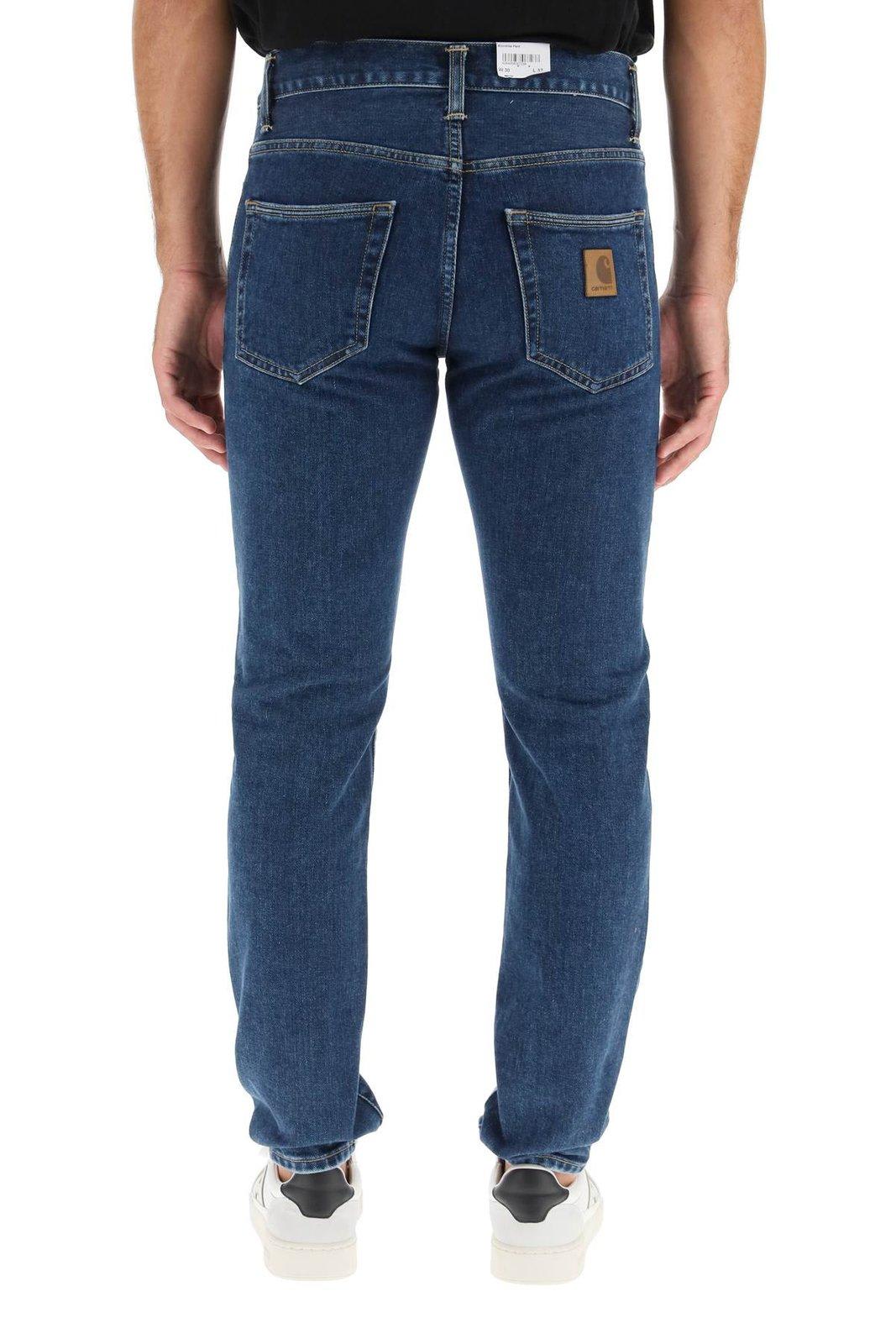 Shop Carhartt Logo Patch Straight Leg Jeans In Blue Stone Washed
