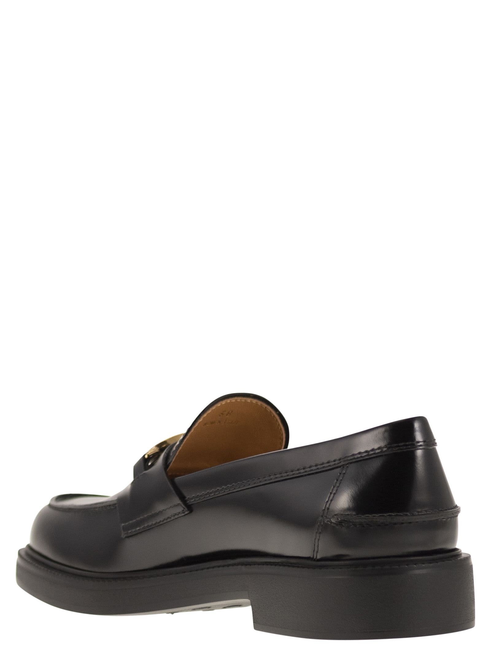 Shop Tod's Leather Moccasin In Black