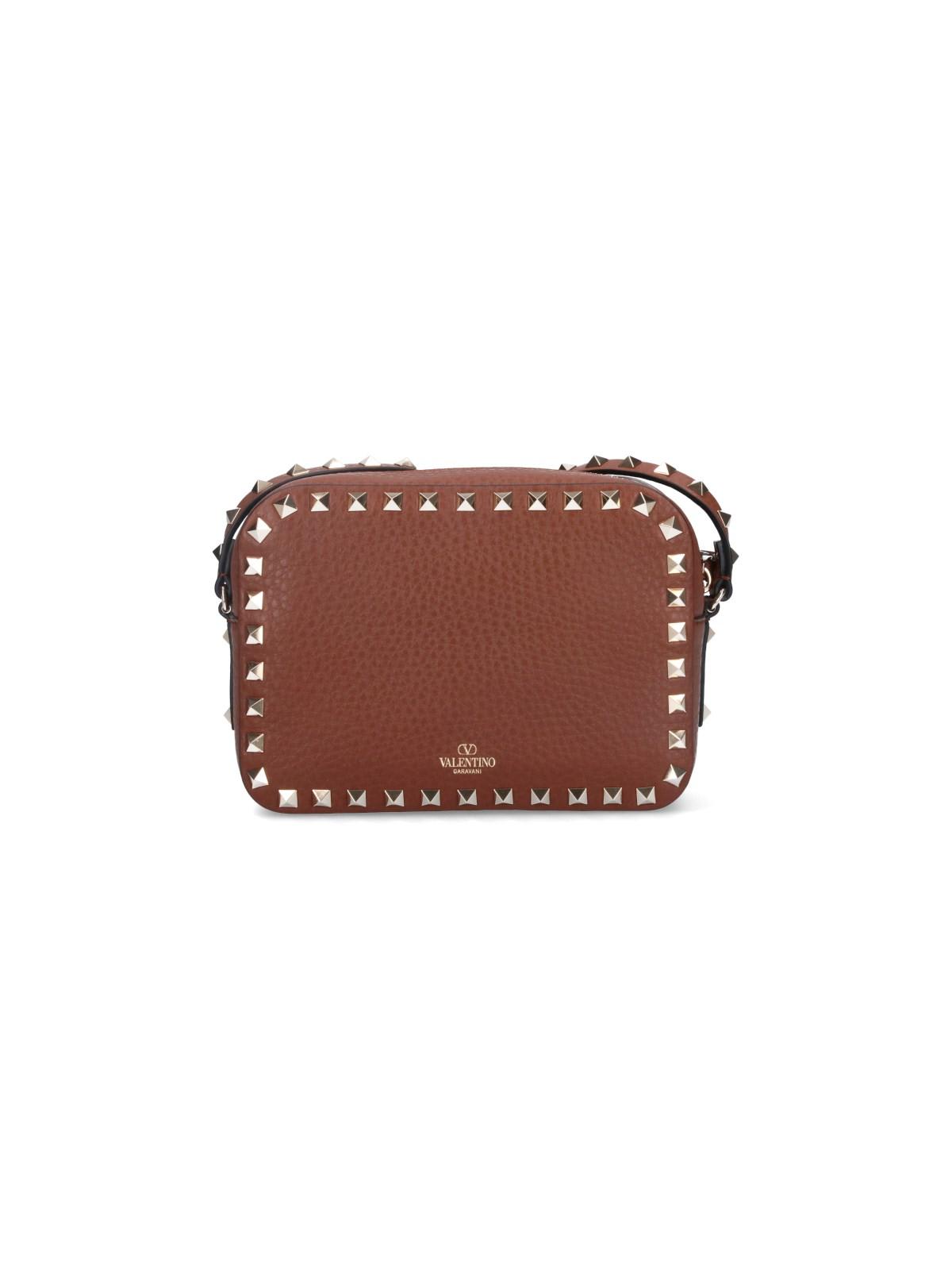 Shop Valentino Rockstud Mini Bag In Brown