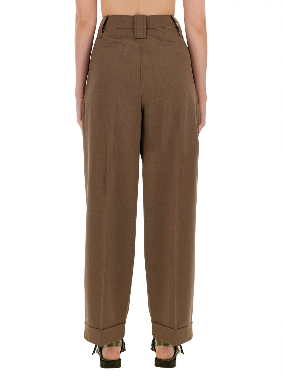 Shop Ganni Loose Fit Pants In Brown