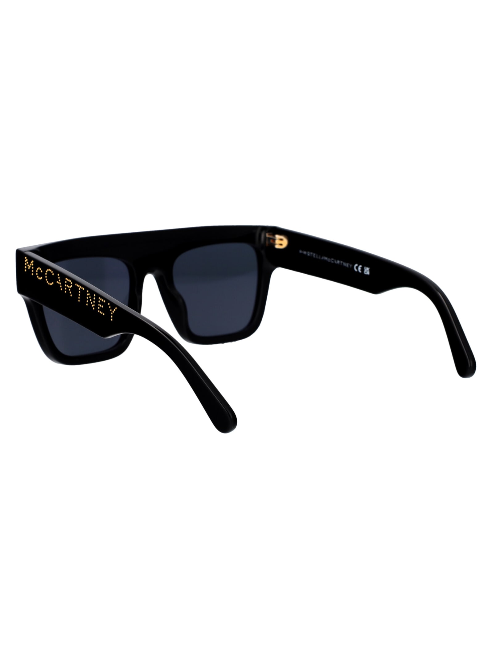 Shop Stella Mccartney Logo Sunglasses In 01a Shiny Black / Smoke