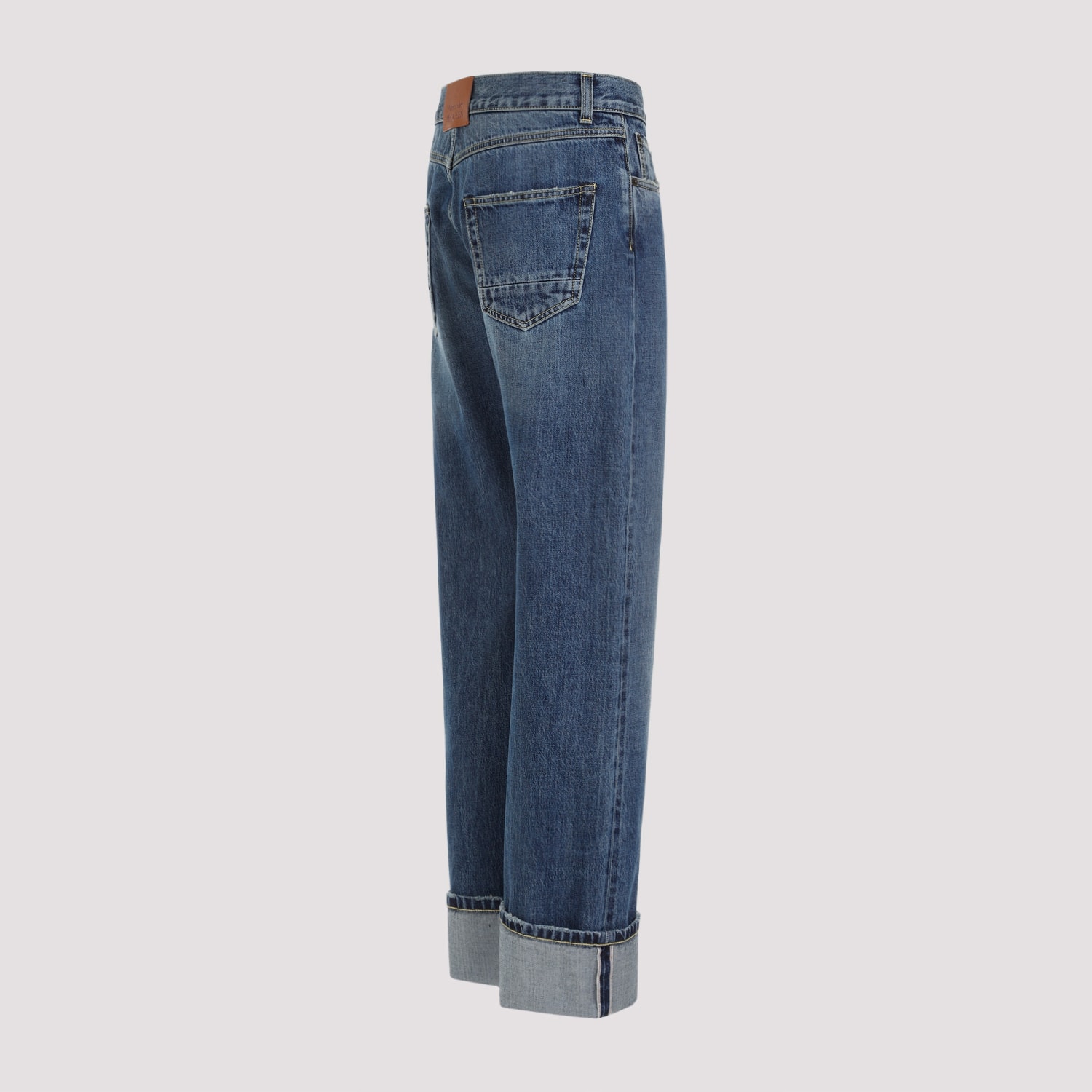 Shop Alexander Mcqueen Turn Up Jeans In Blue Washed