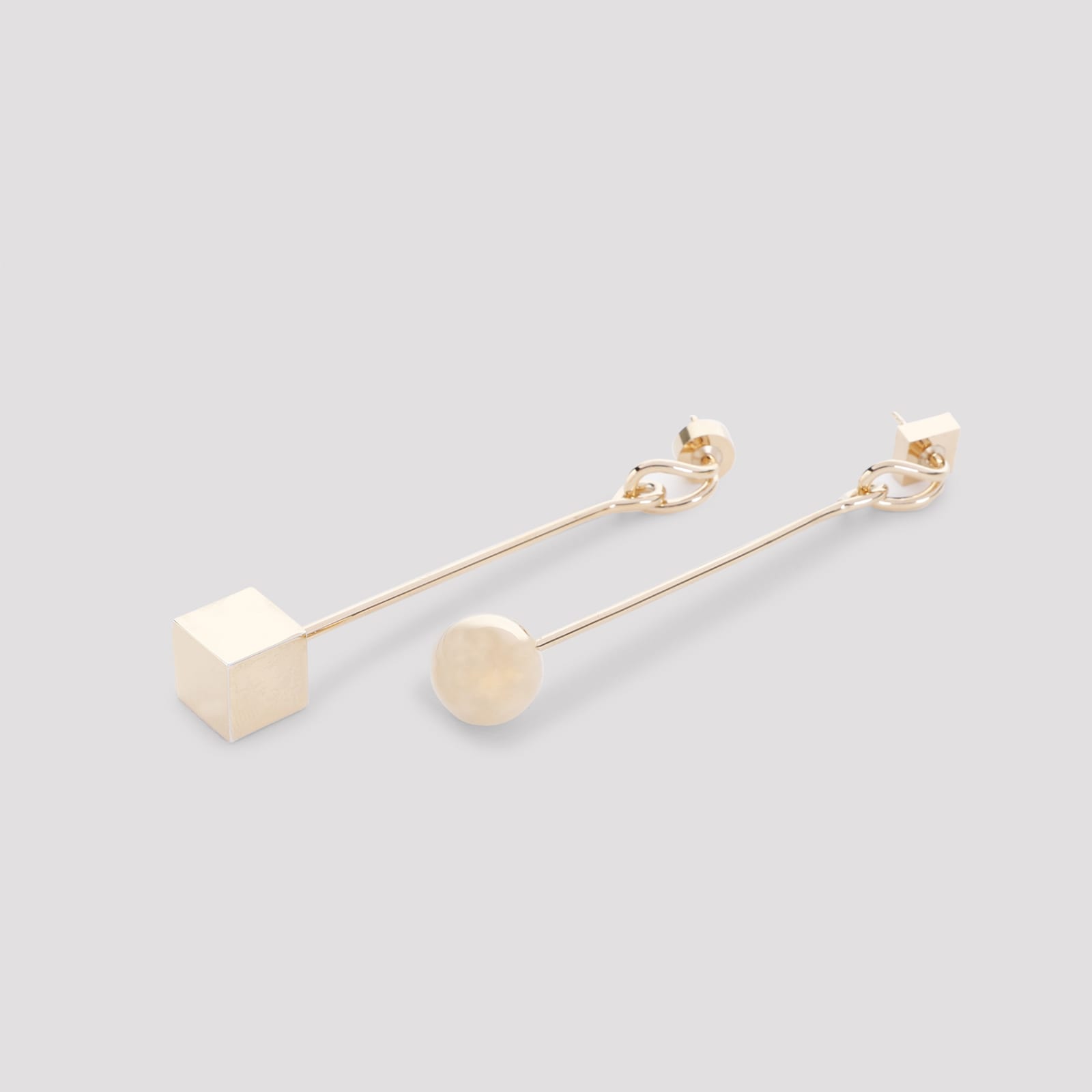JACQUEMUS JACQUEMUS BRASS EARRINGS