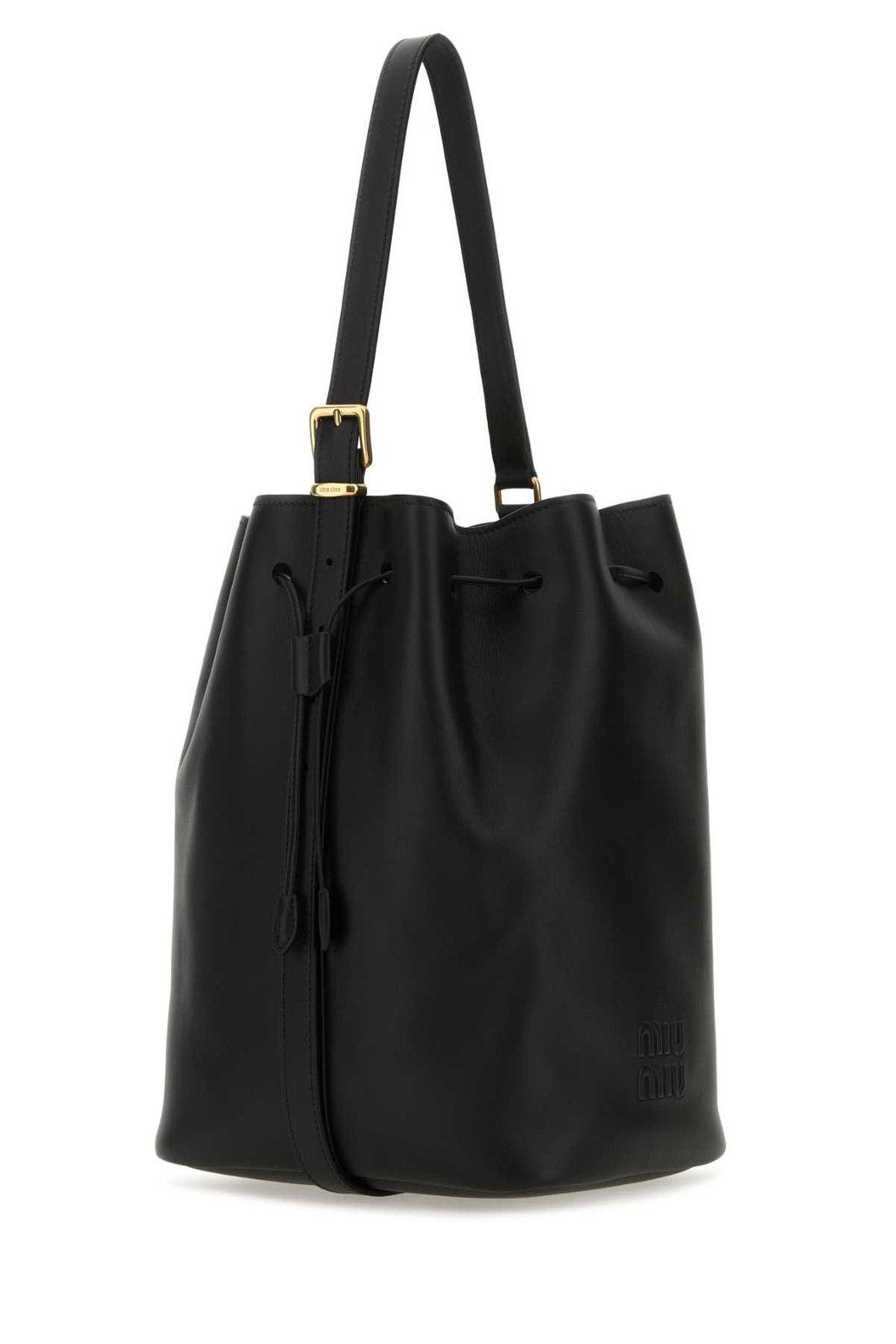 Shop Miu Miu Logo-embossed Drawstring Bucket Bag In Nero