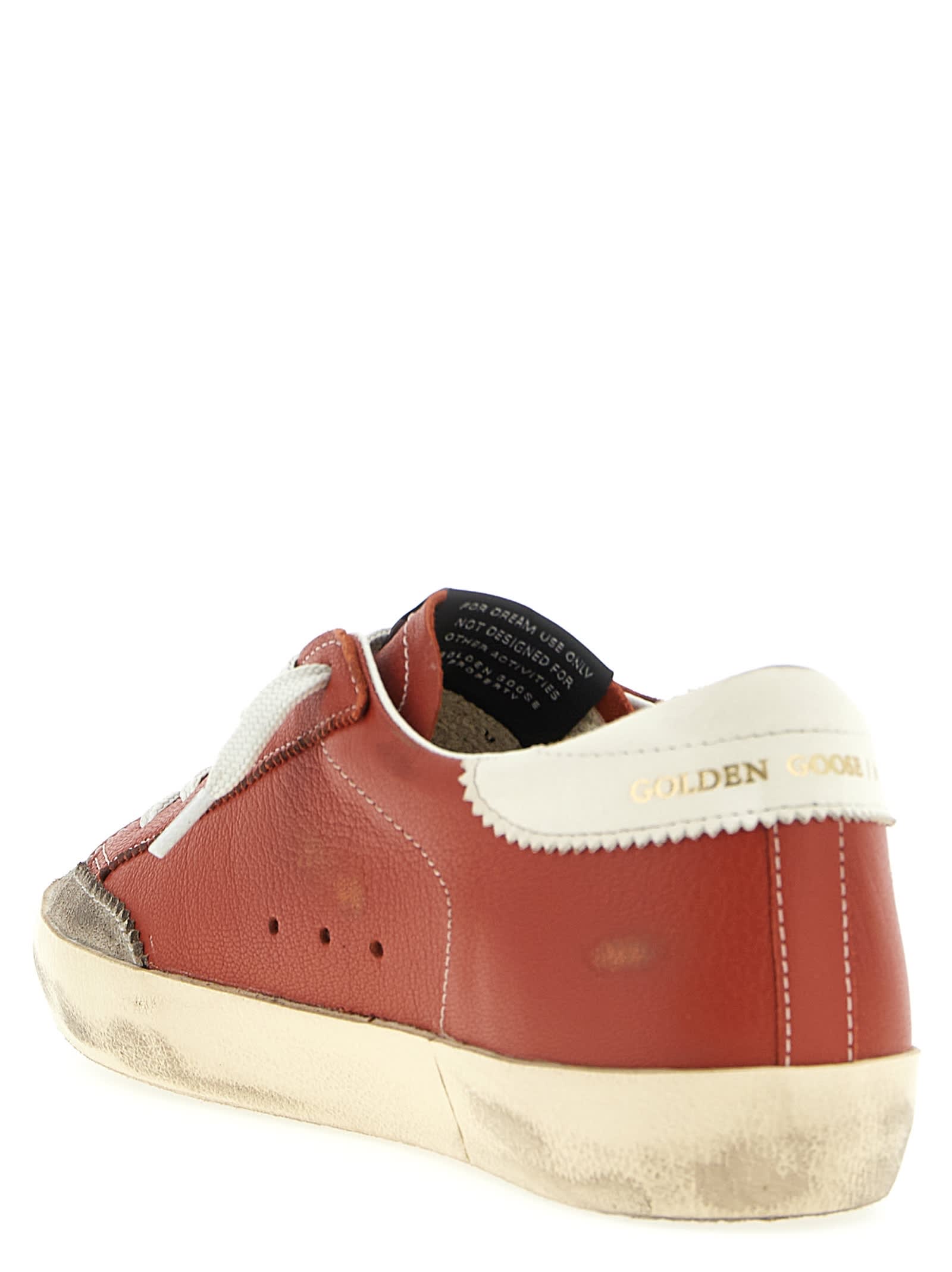 Golden Goose Super-star Distressed Suede-trimmed Leather Sneakers In Orange