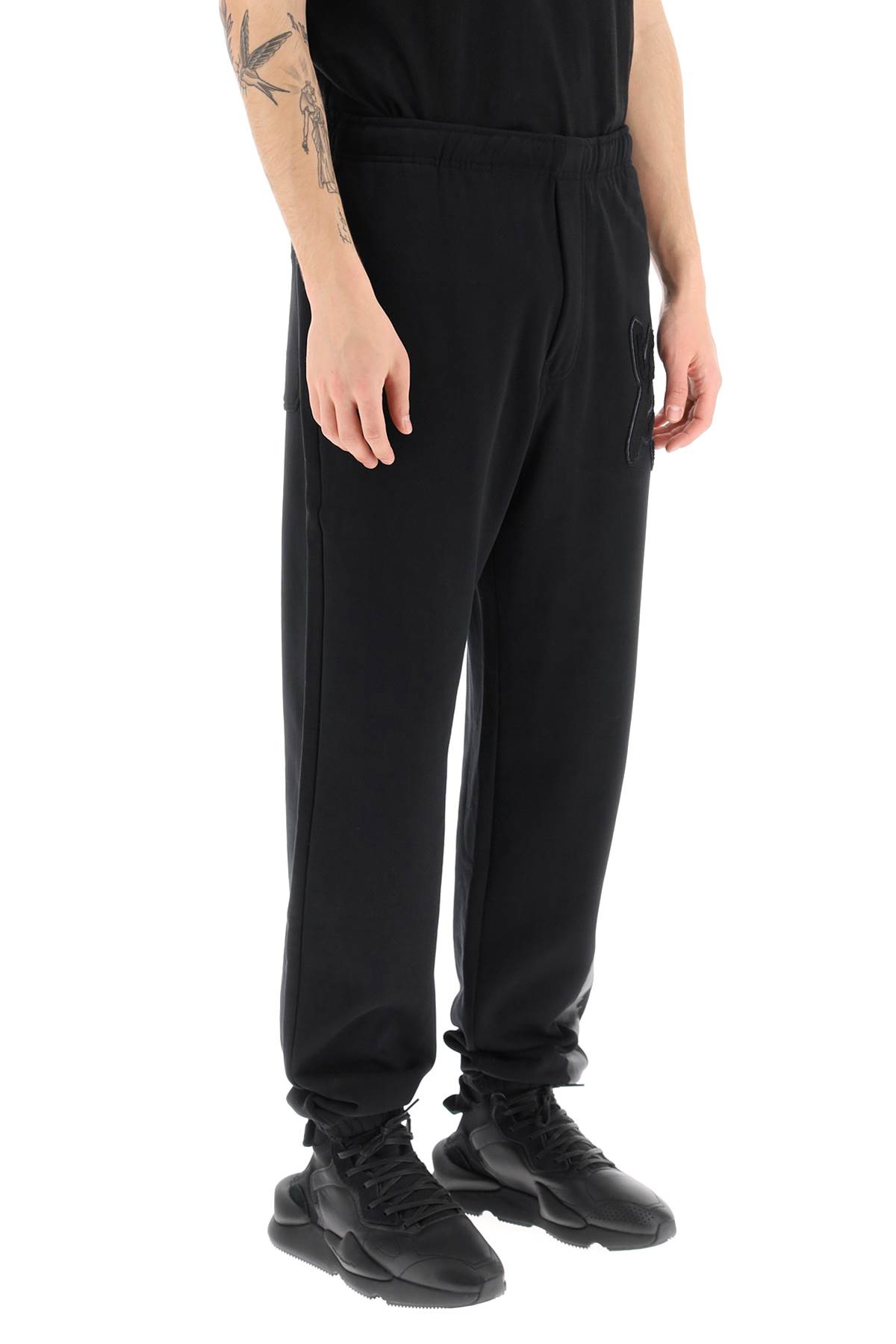 Shop Y-3 Jogger Pants With Coated Detail In Black (black)