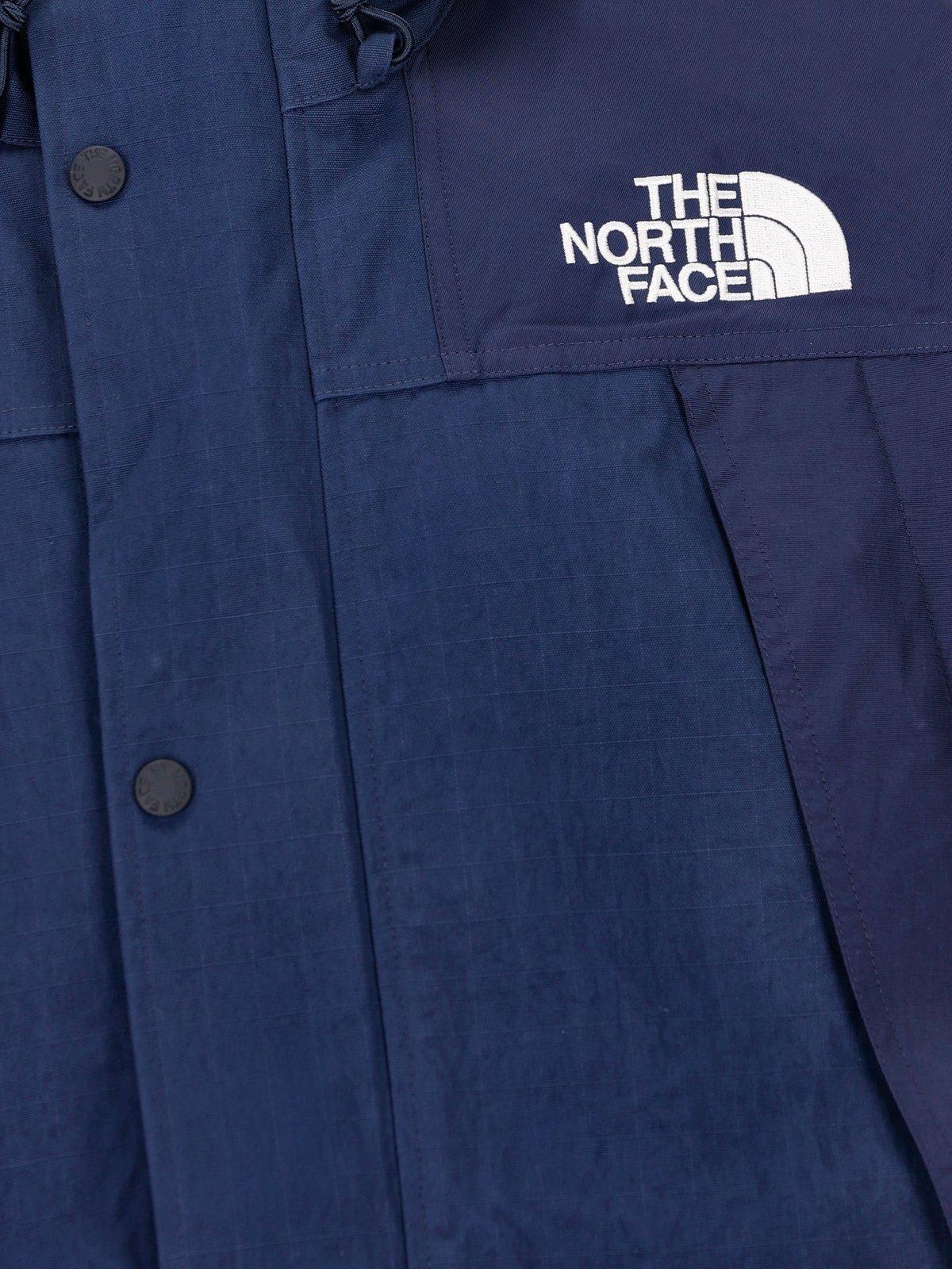 Shop The North Face Ripstop Mountain Logo Embroidered Hooded Jacket In Blue