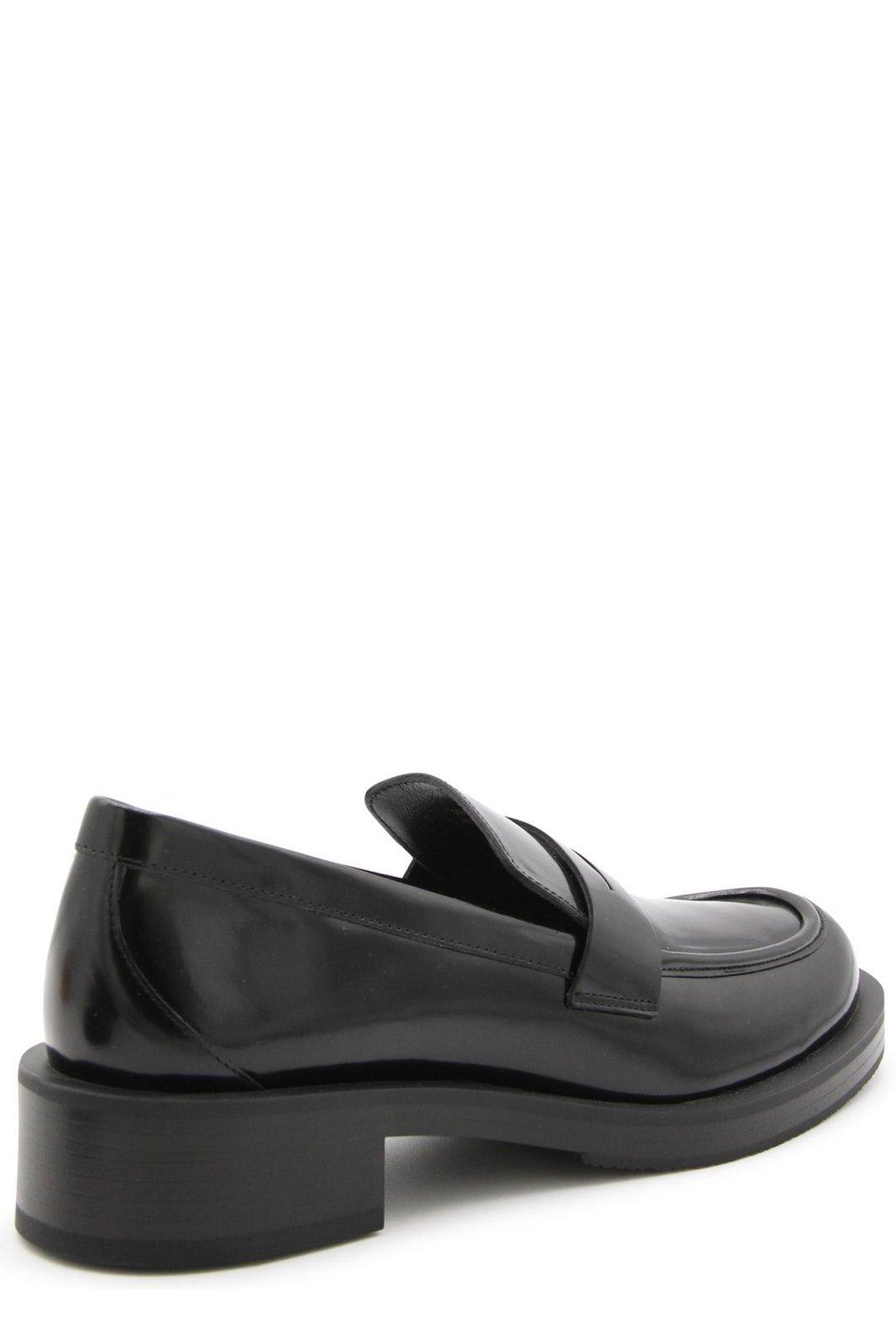 Shop Stuart Weitzman Palmer Slip-on Loafers In Black