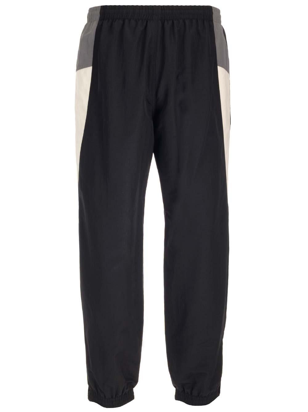 Shop Balenciaga Logo Print Panelled Track Pants In Black