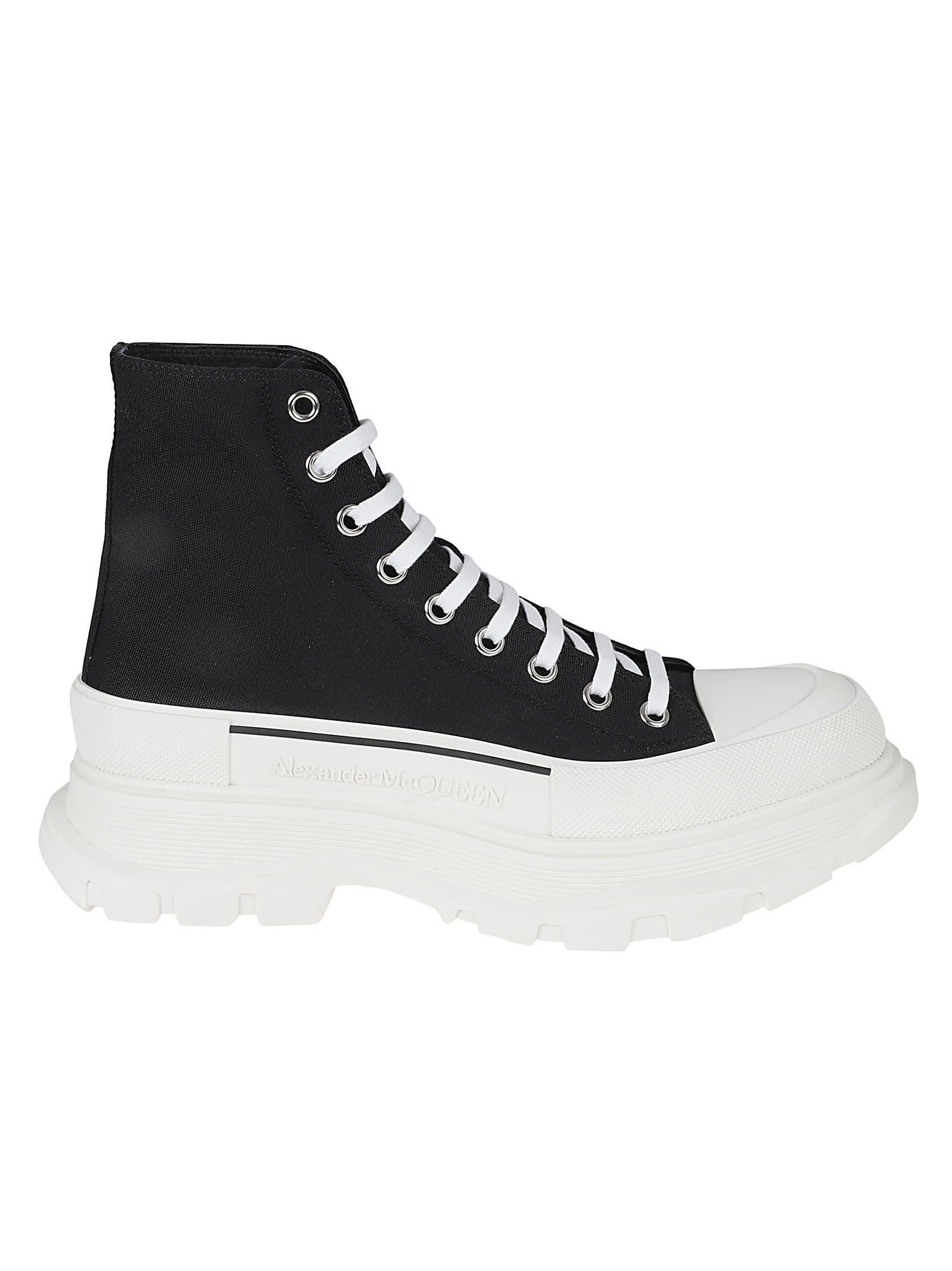 Shop Alexander Mcqueen Logo Embossed Lace-up Boots In Black/white
